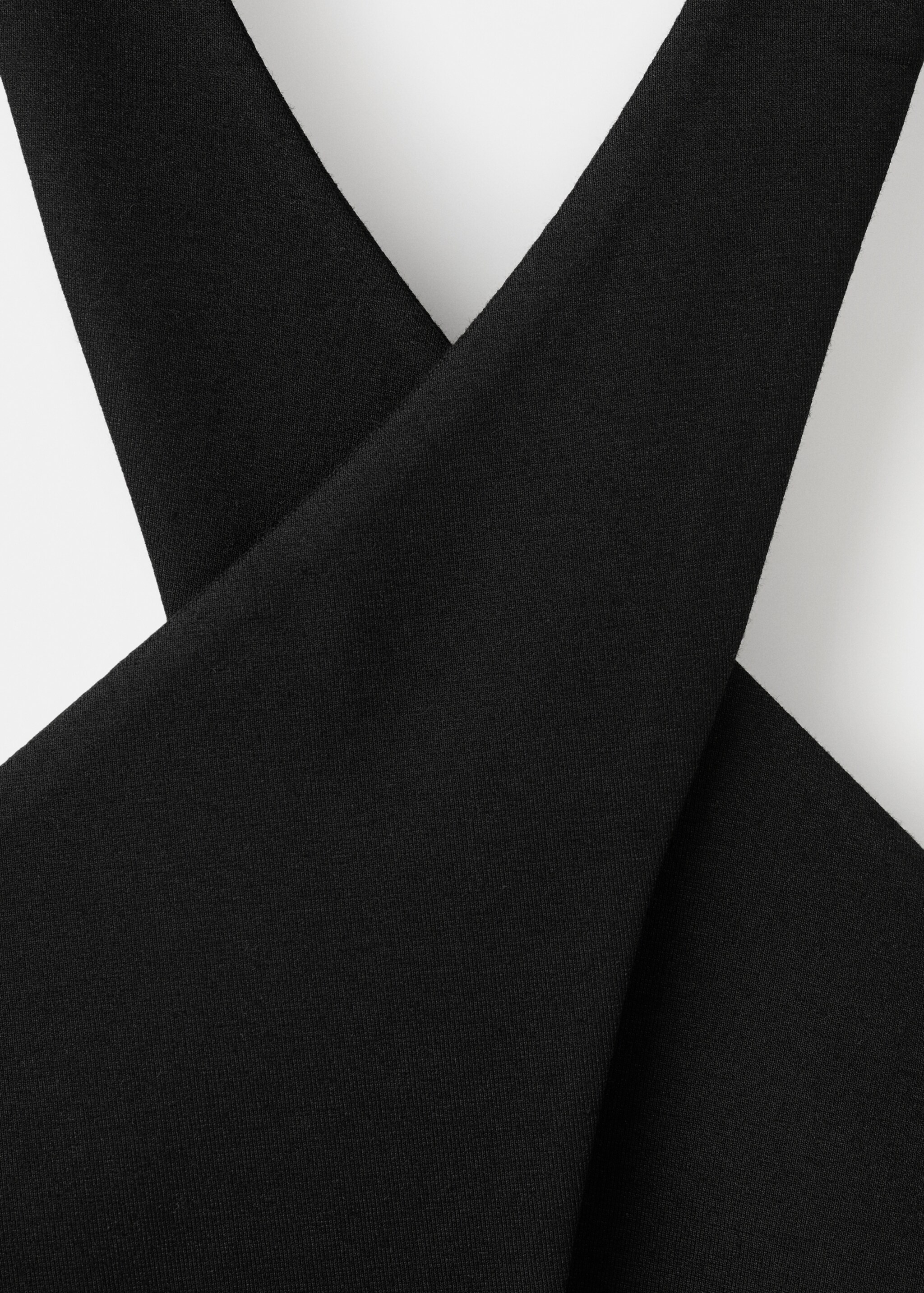 Halter-neck gilet with buttons - Details of the article 8, Black. Ref: 27061249-00.