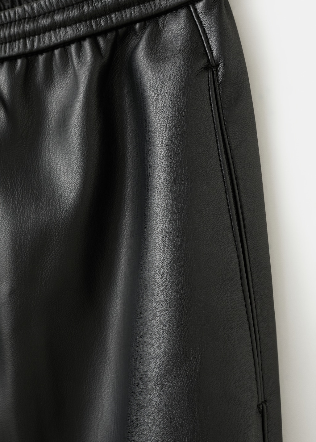 Faux-leather pants with elastic waist