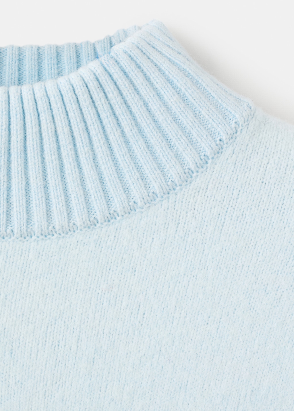 Knitted sweater with openings