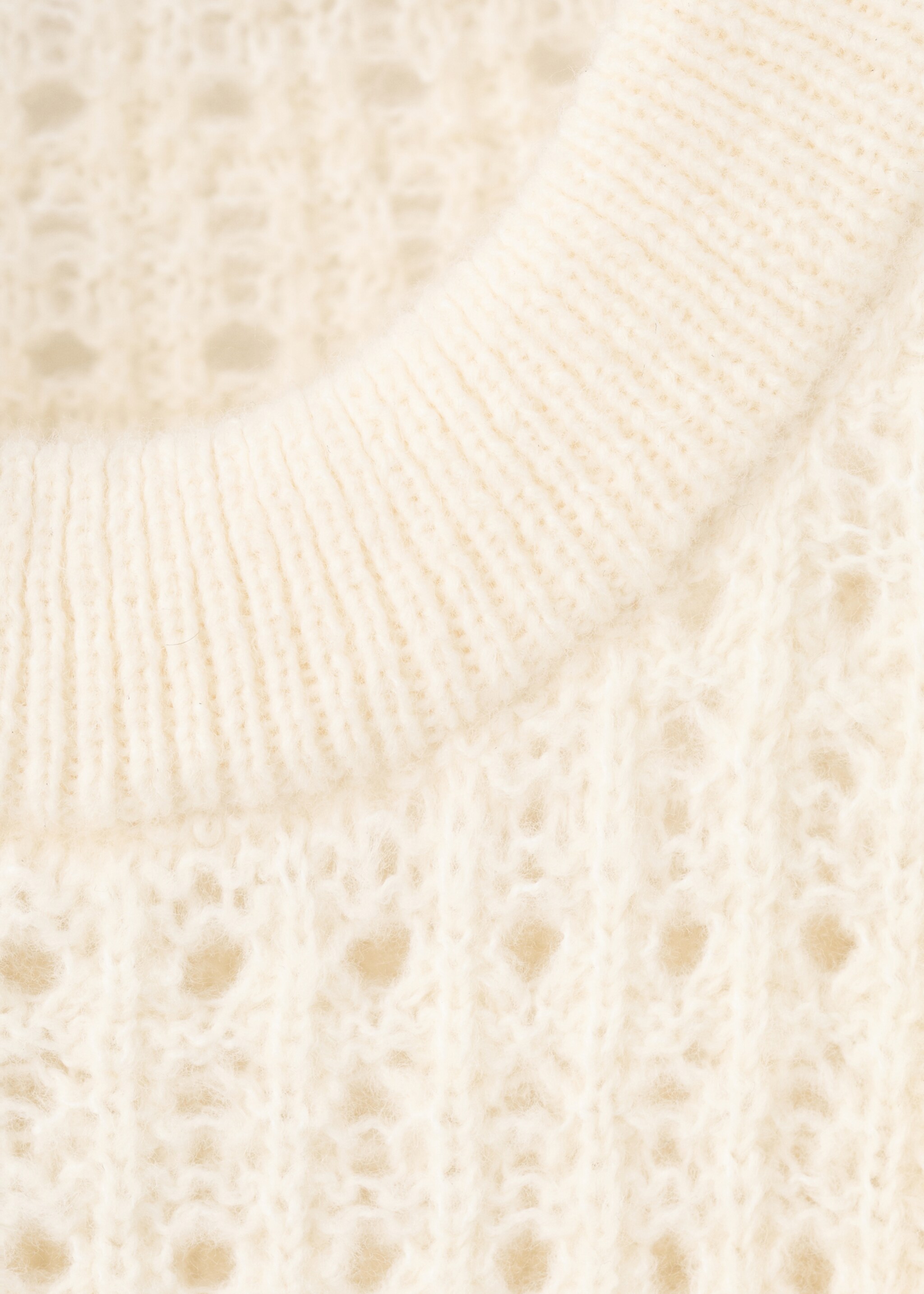 Openwork knitted sweater with ruffles - Details of the article 8, Ecru. Ref: 27061344-00.