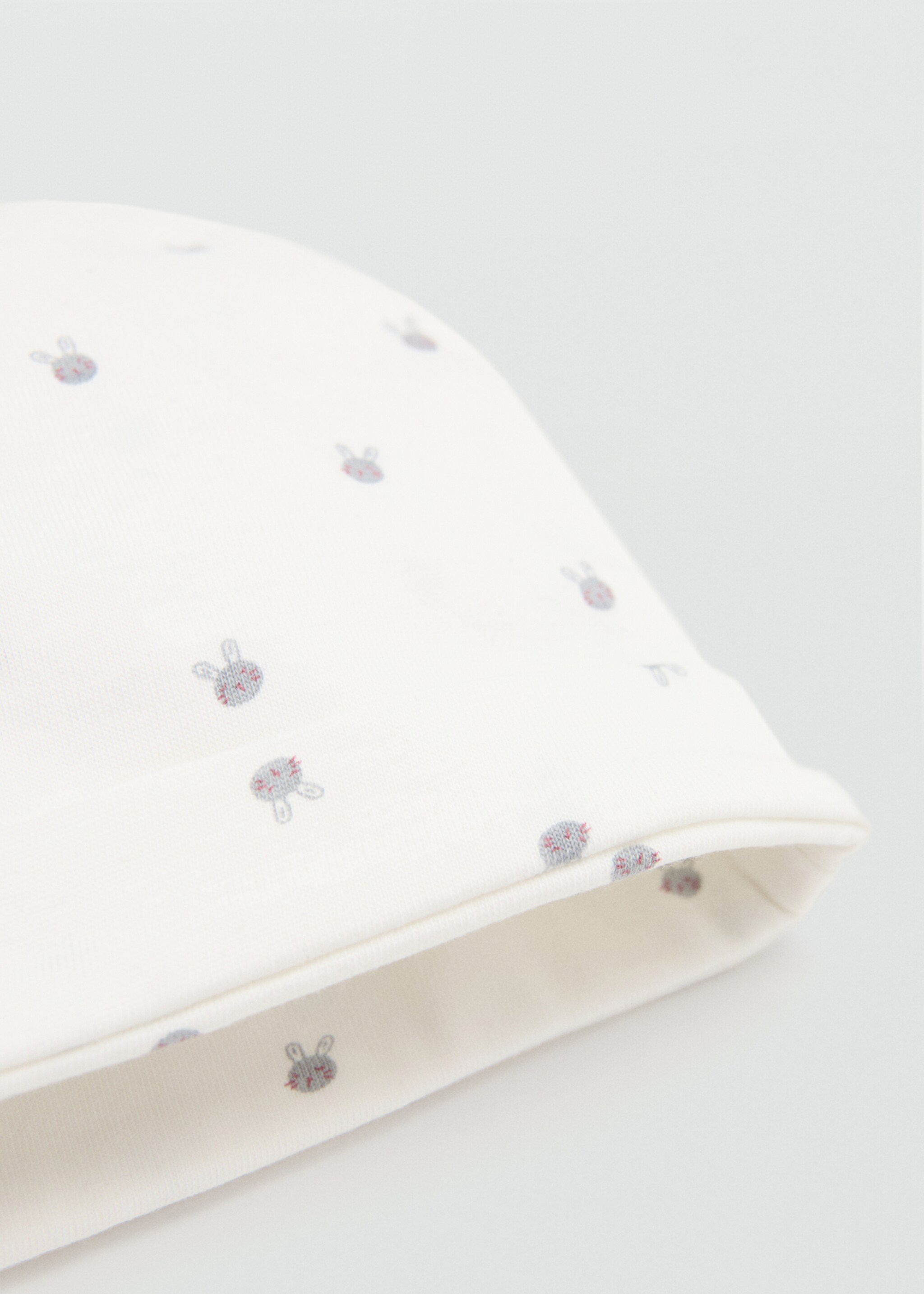 Printed cap with knot detail - Medium plane, Off White. Ref: 27062552-00.