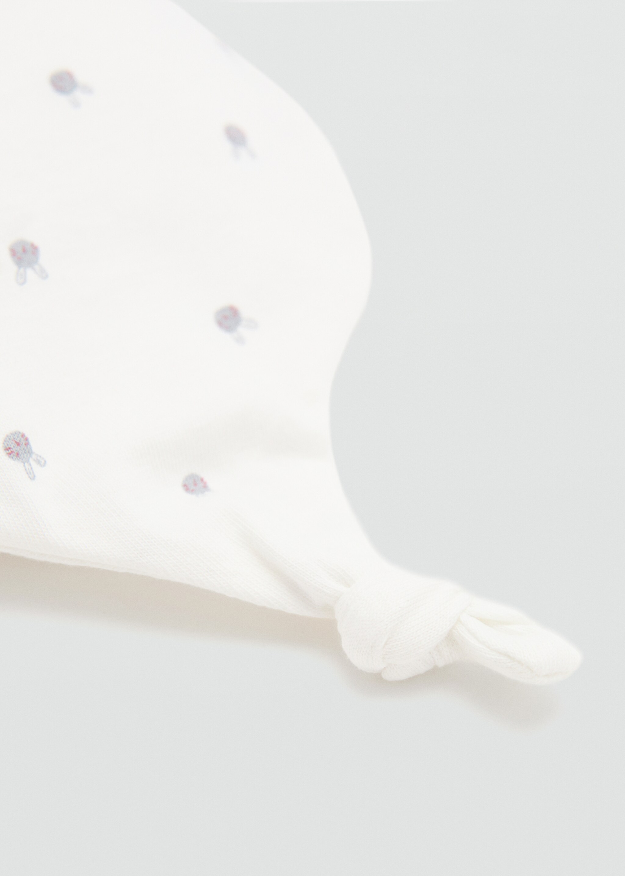 Printed cap with knot detail - Details of the article 1, Off White. Ref: 27062552-00.