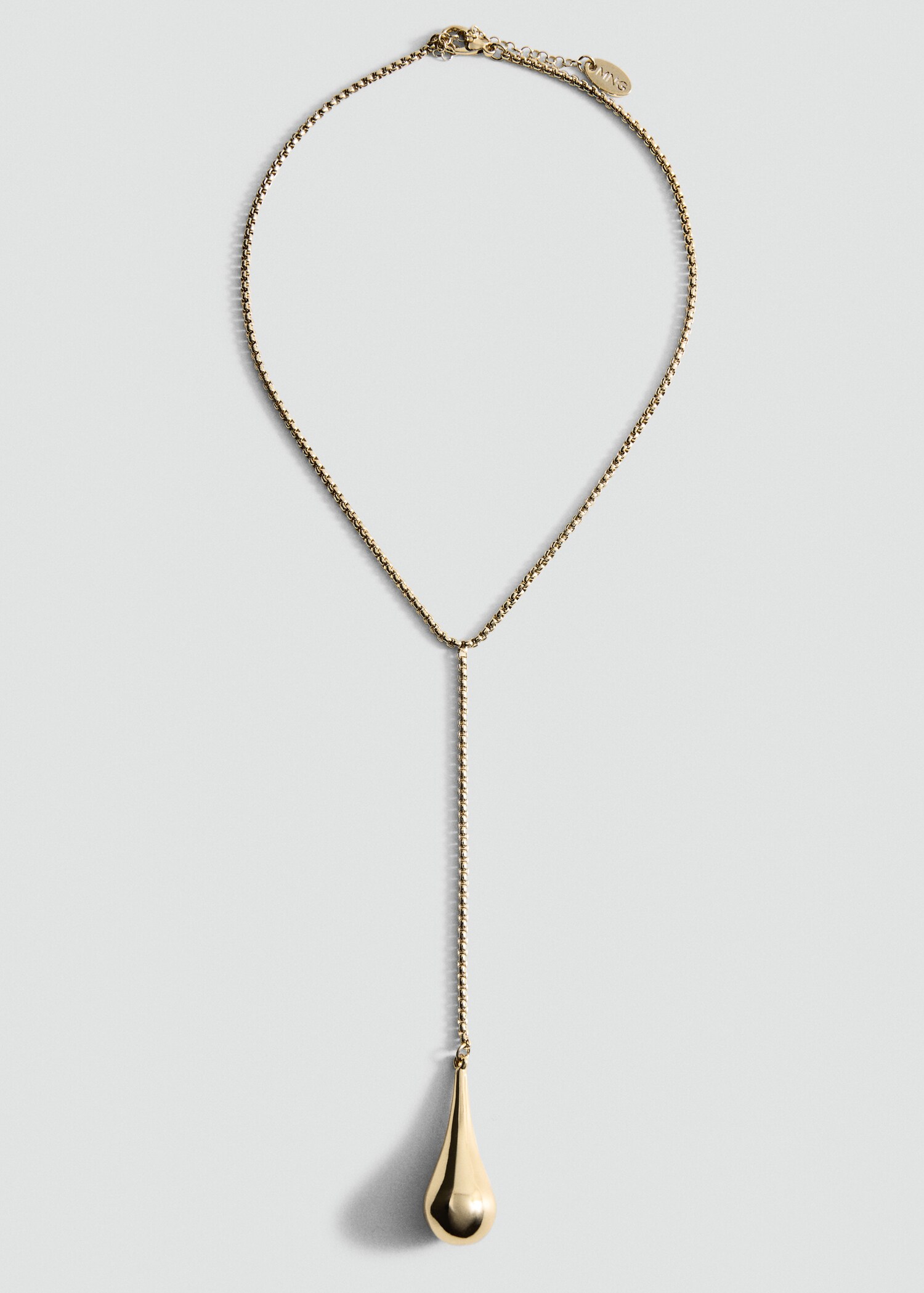 Collier avec pendentif métallique - Article sans modèle