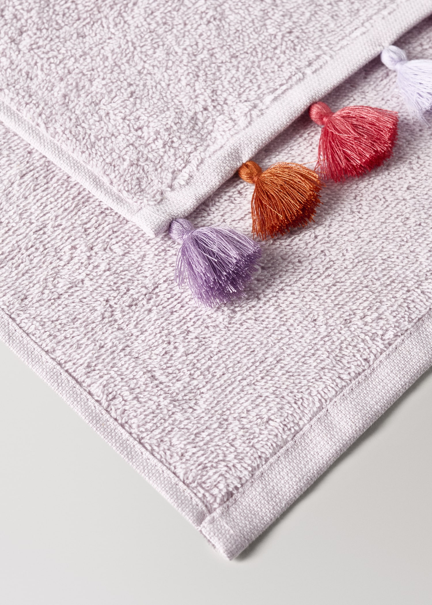 Cotton children's multi-coloured hand towel with pompoms - Details of the article 2