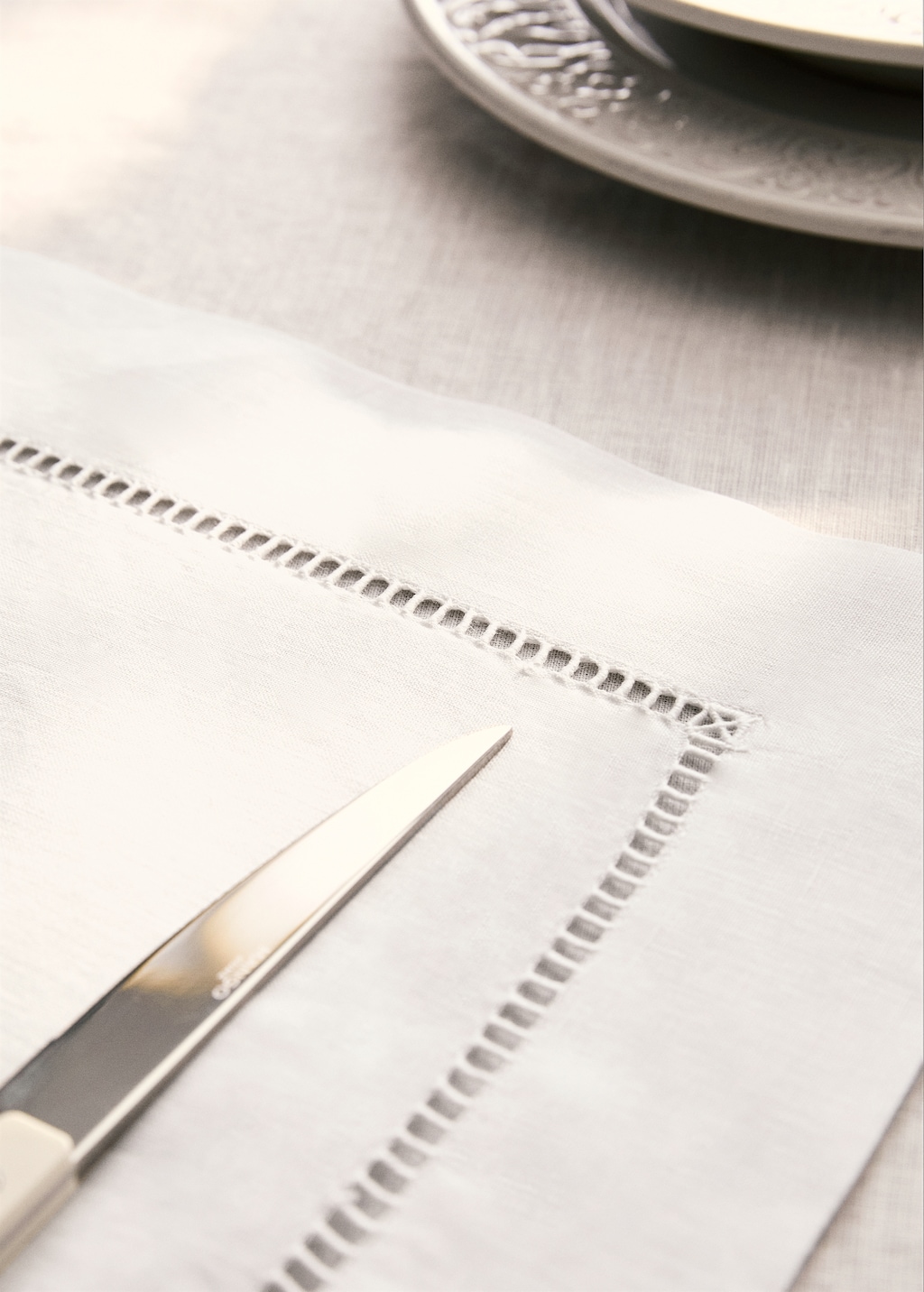 Embroidered hemstitched linen placemat