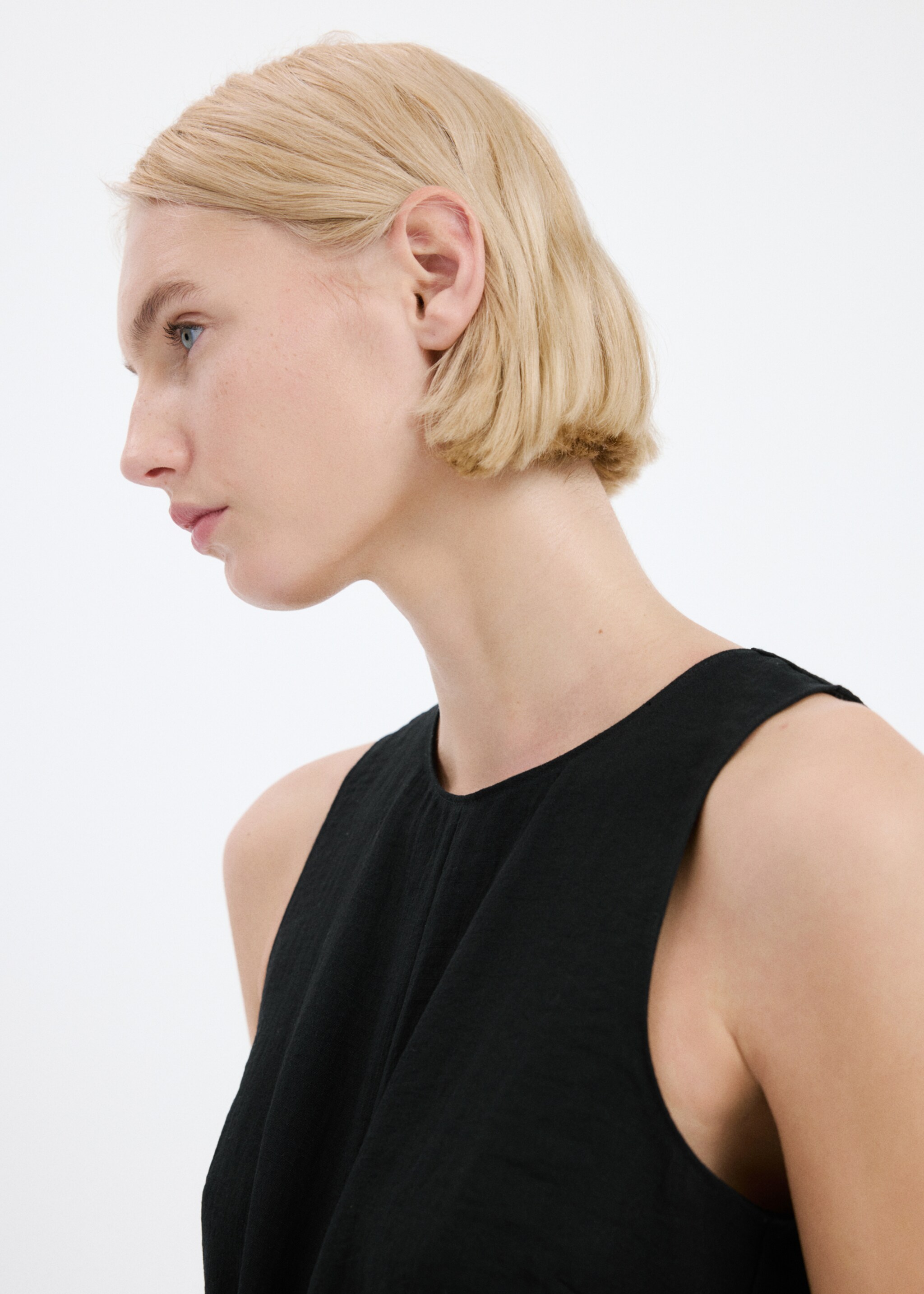 Cut-out jumpsuit with knot - Details of the article 1, Black. Ref: 27063298-00.