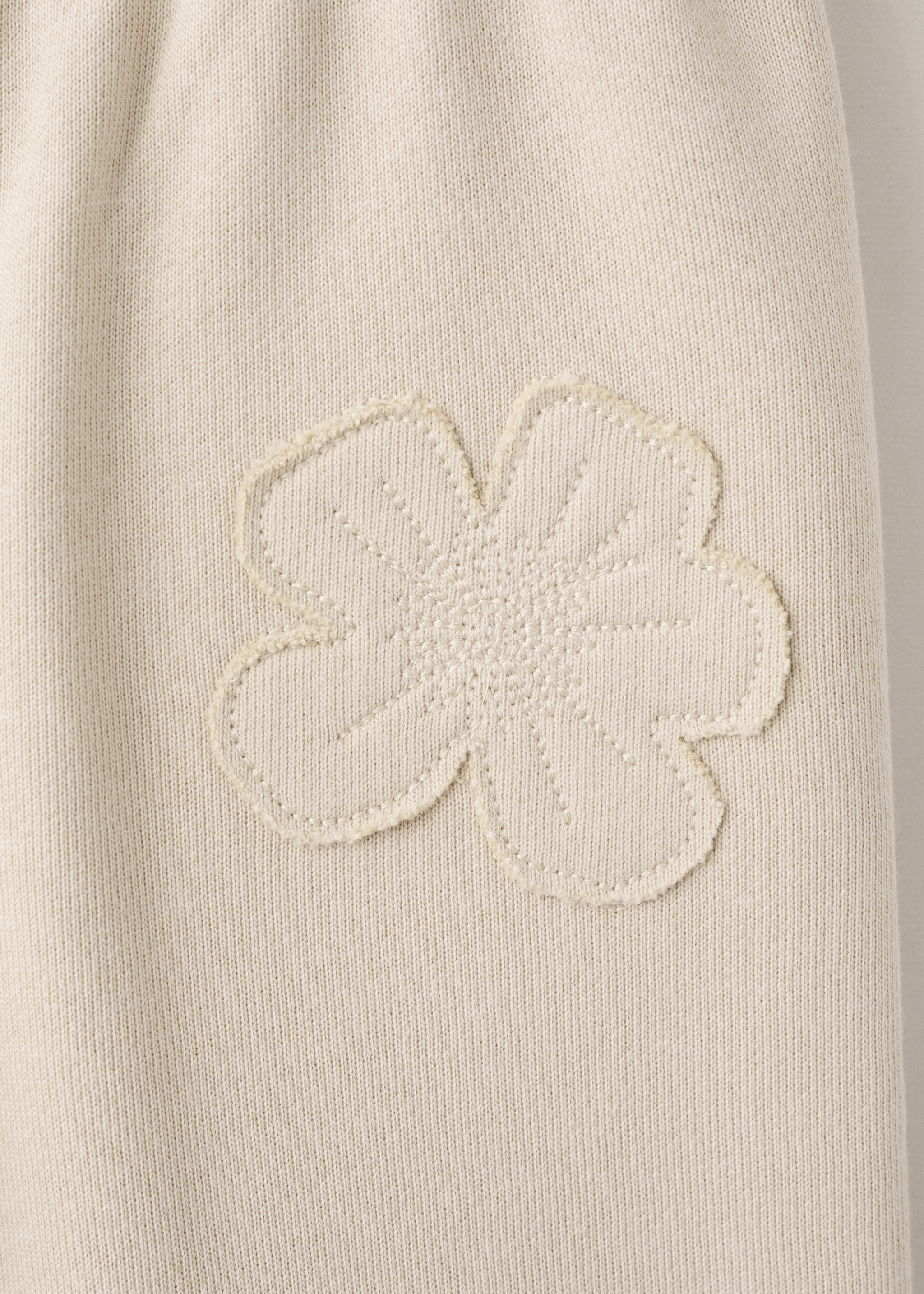 Cotton joggers embroidered detail - Details of the article 0, Beige. Ref: 27063713-00.