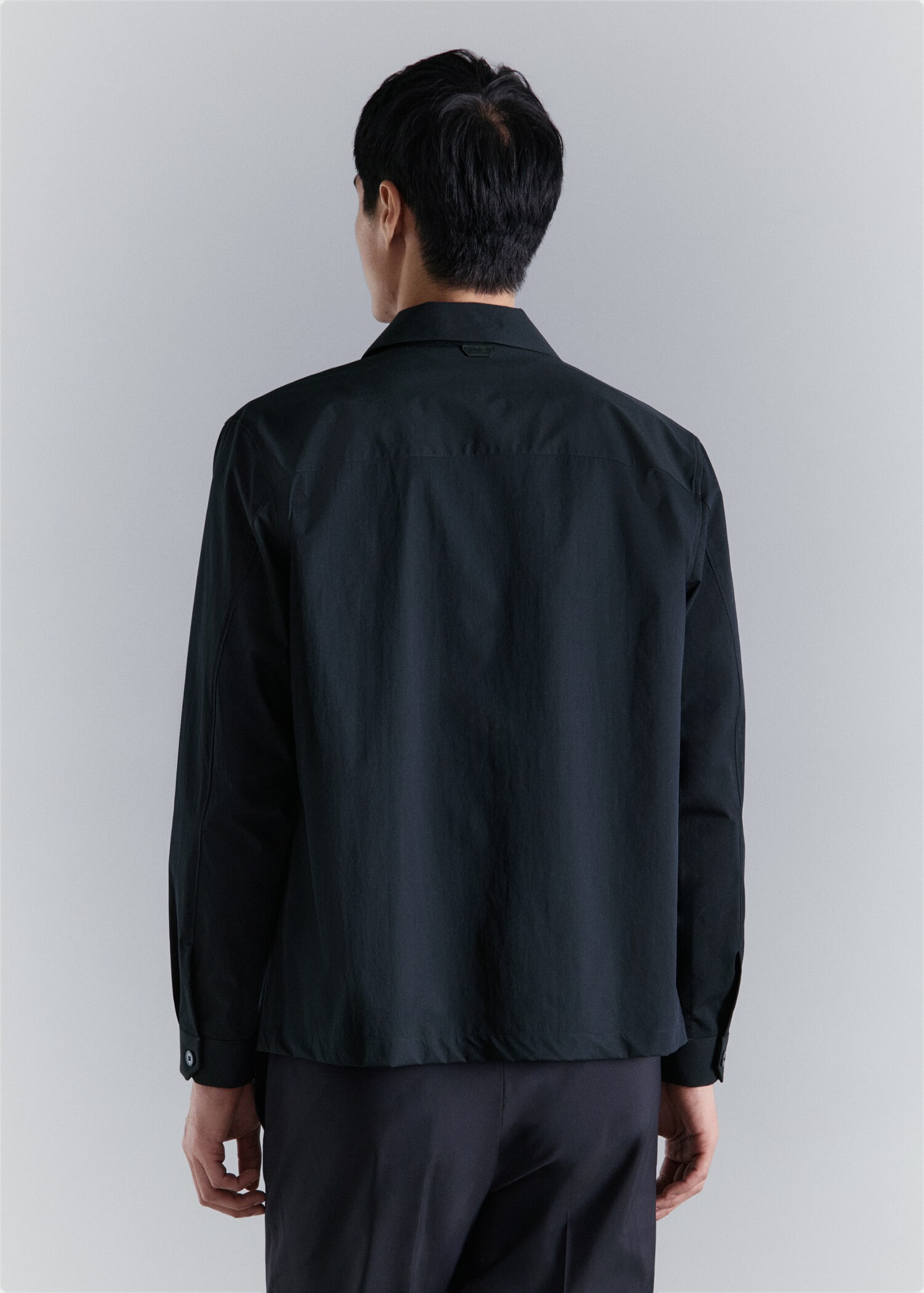 Non-iron overshirt pocket - Reverse of the article