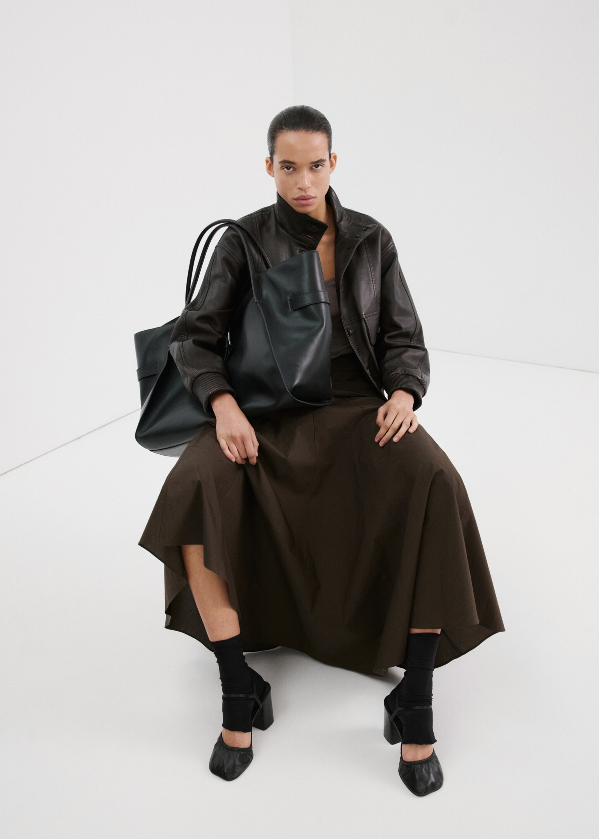 A-line skirt with handkerchief detail - Details of the article 2, Chocolate. Ref: 27065971-00.