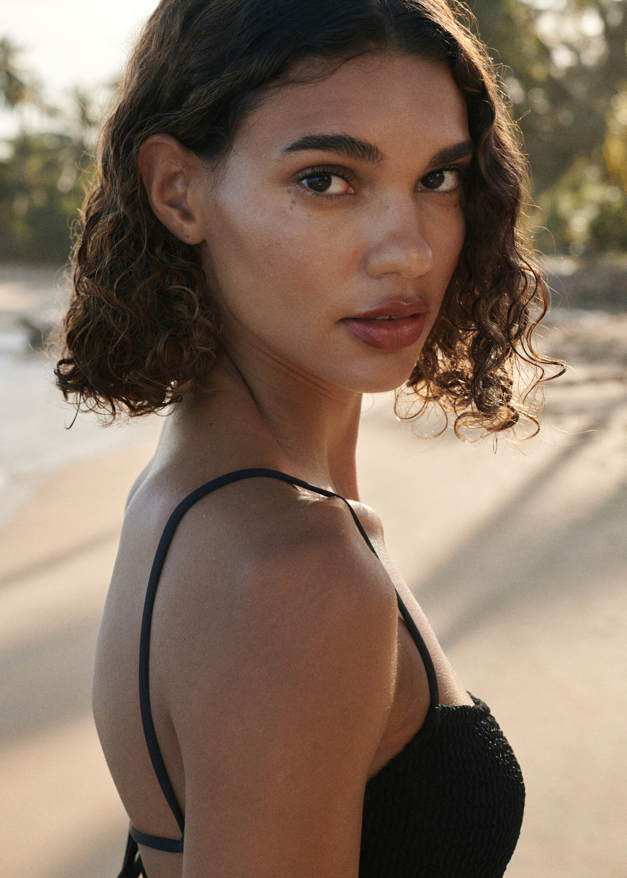 Textured swimsuit with straps - Details of the article 1, Black. Ref: 27066736-00.