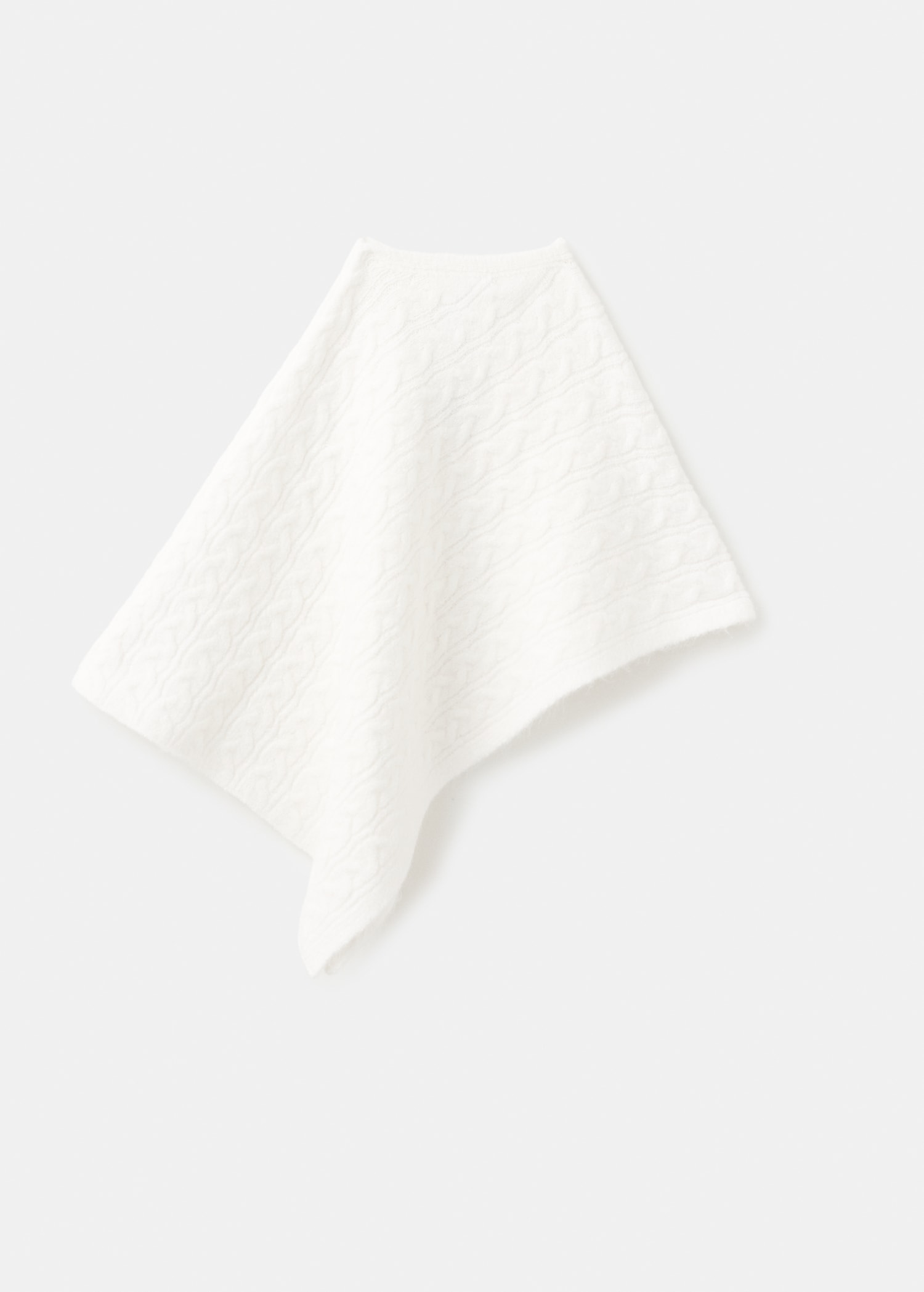 Cable-knit poncho - Reverse of the article