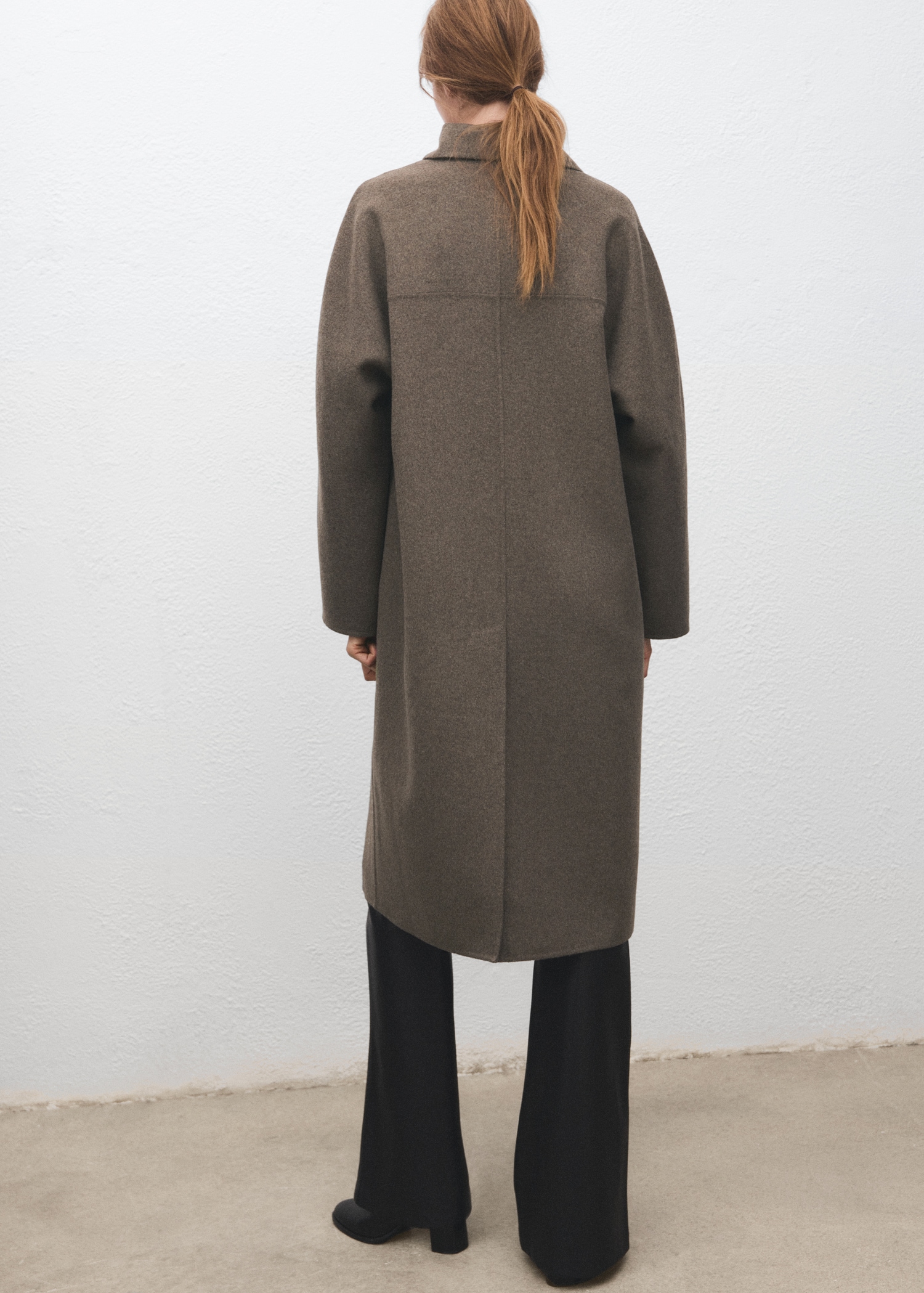 Handmade oversized wool coat - Reverse of the article