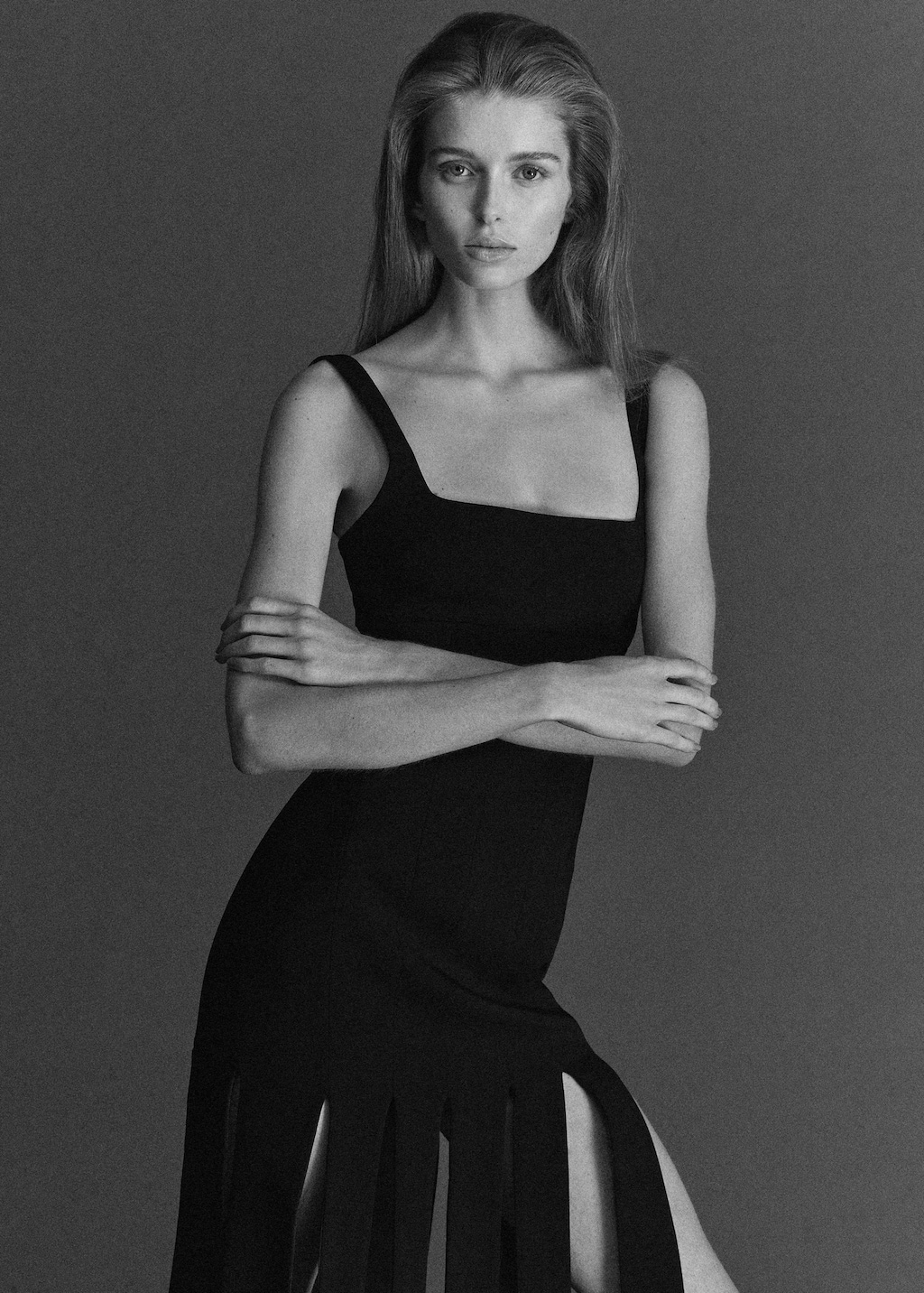 Low-cut dress with fringed hem