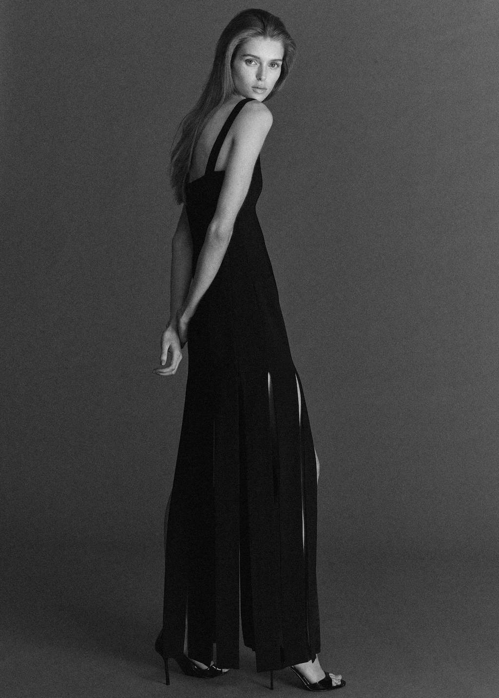 Low-cut dress with fringed hem