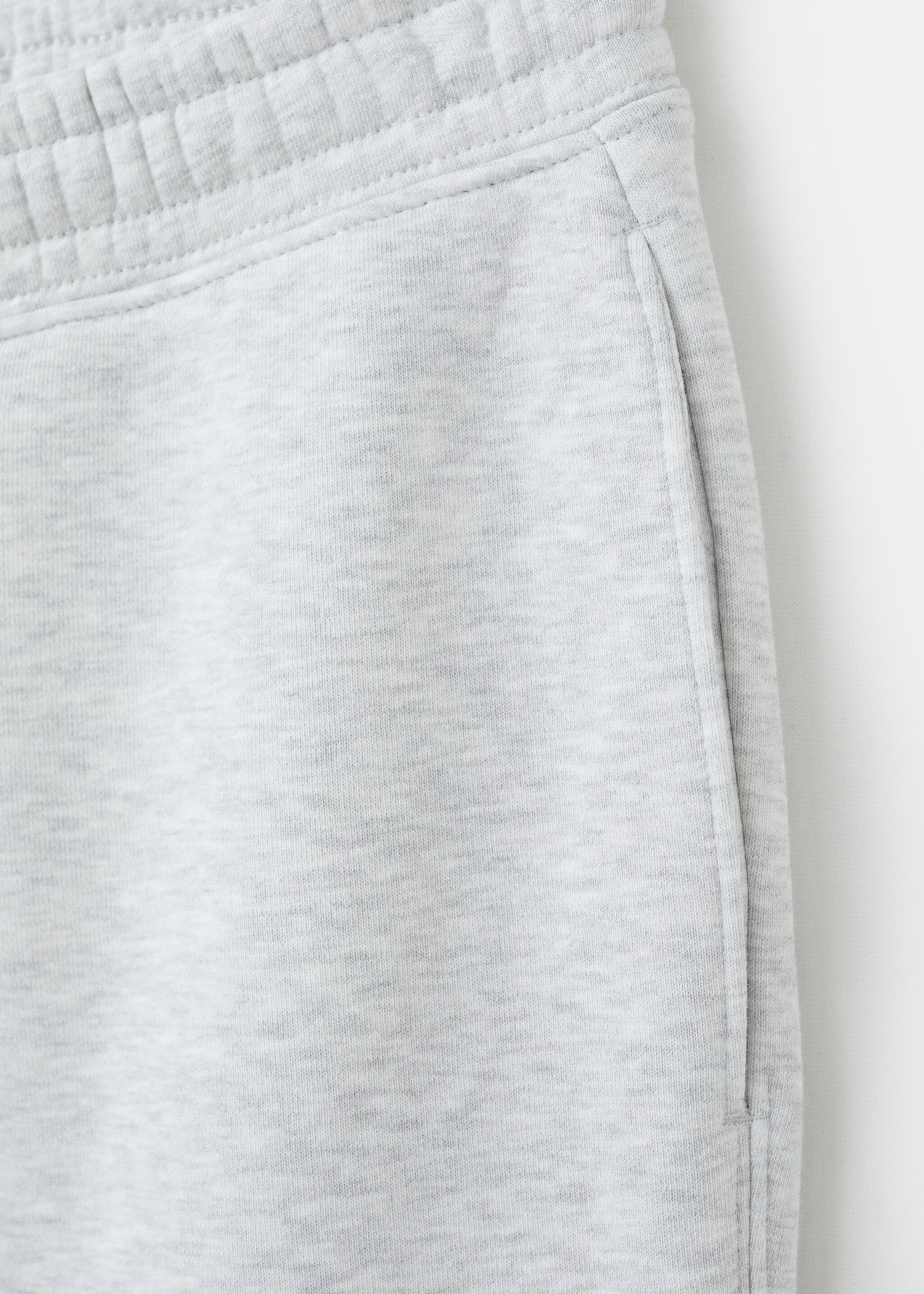 Cotton joggers with elastic waist - Details of the article 8, Light Heather Grey. Ref: 27071258-00.