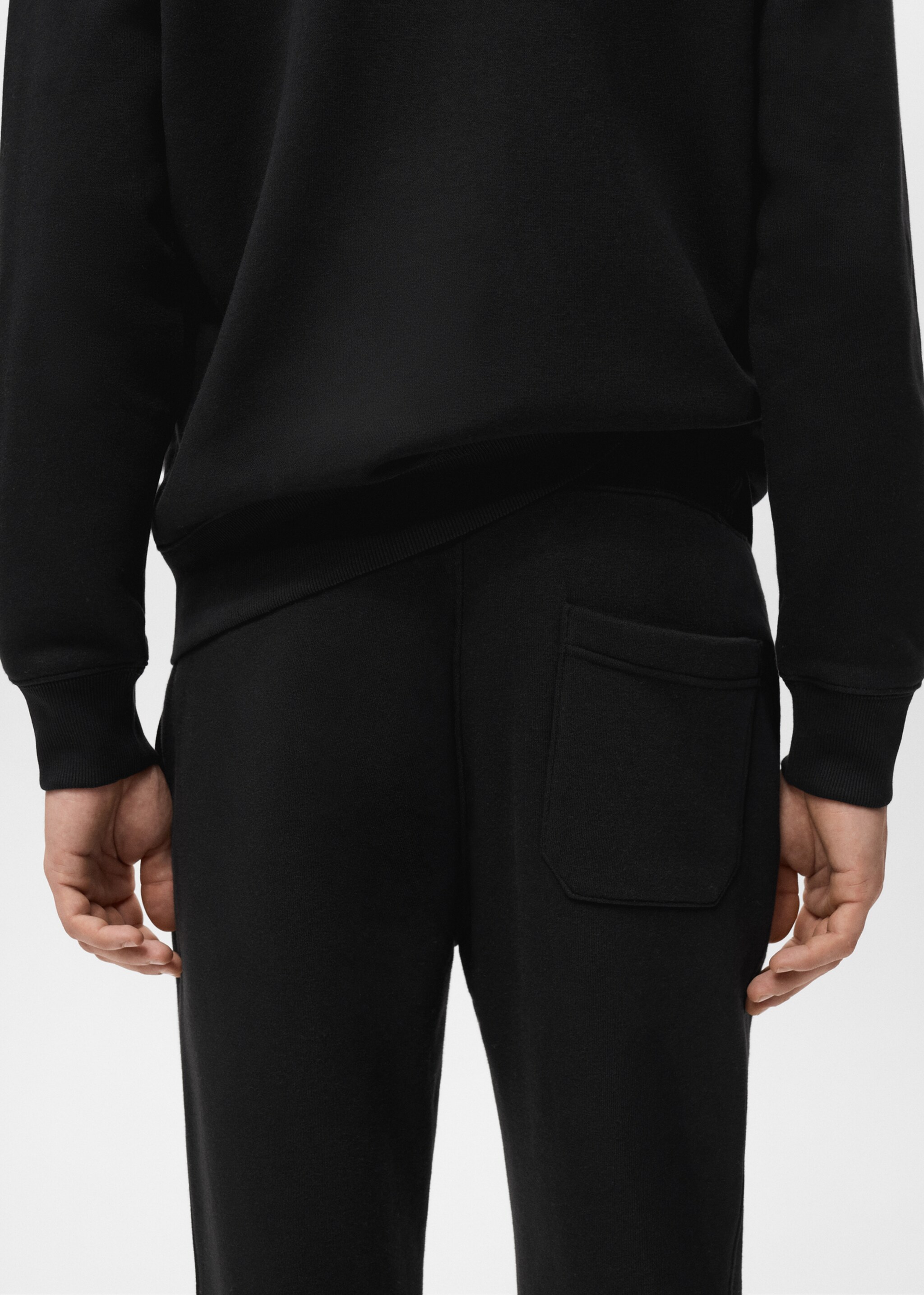 Cotton joggers with elastic waist - Details of the article 6, Black. Ref: 27071258-00.