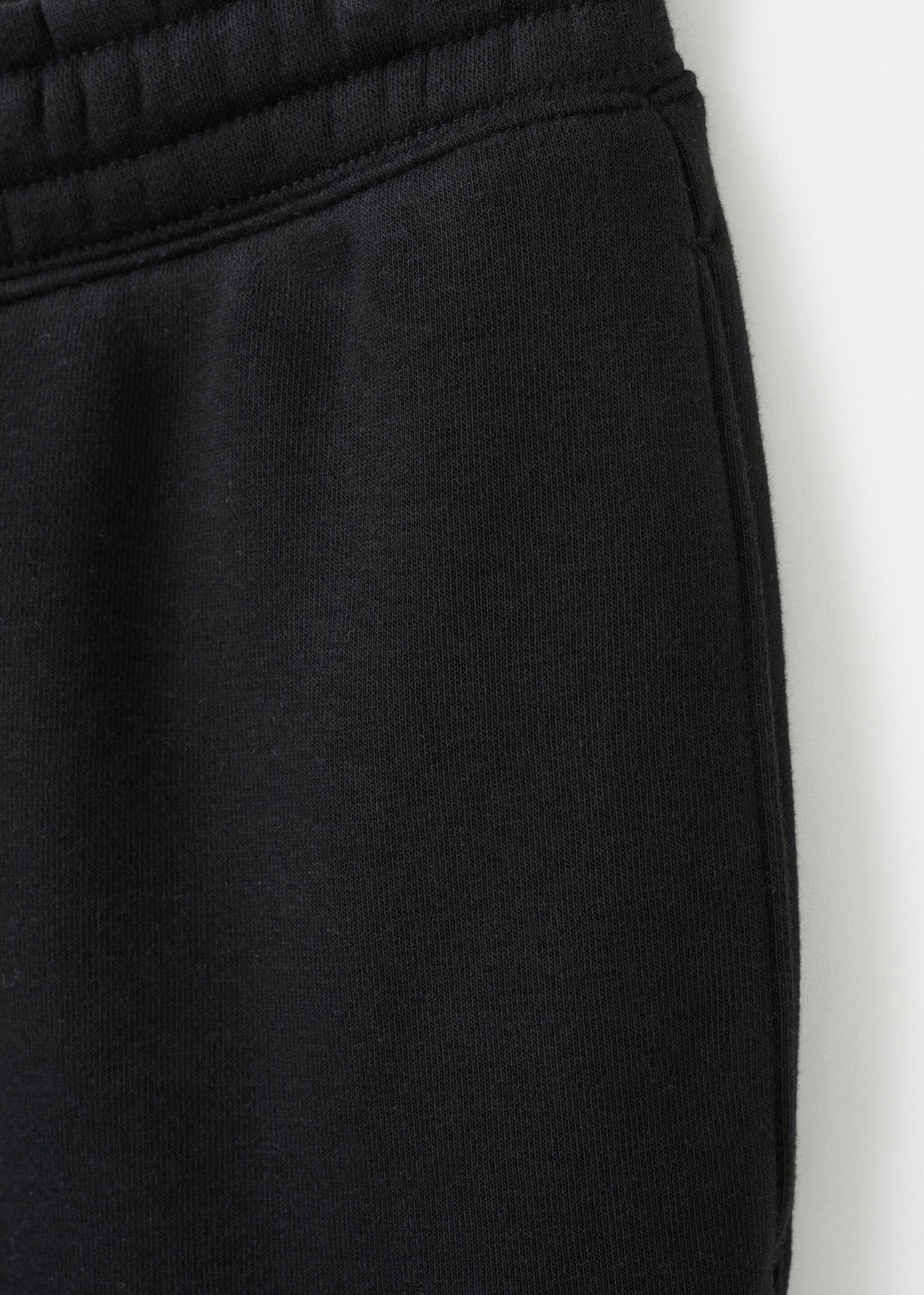 Cotton joggers with elastic waist - Details of the article 8, Black. Ref: 27071258-00.