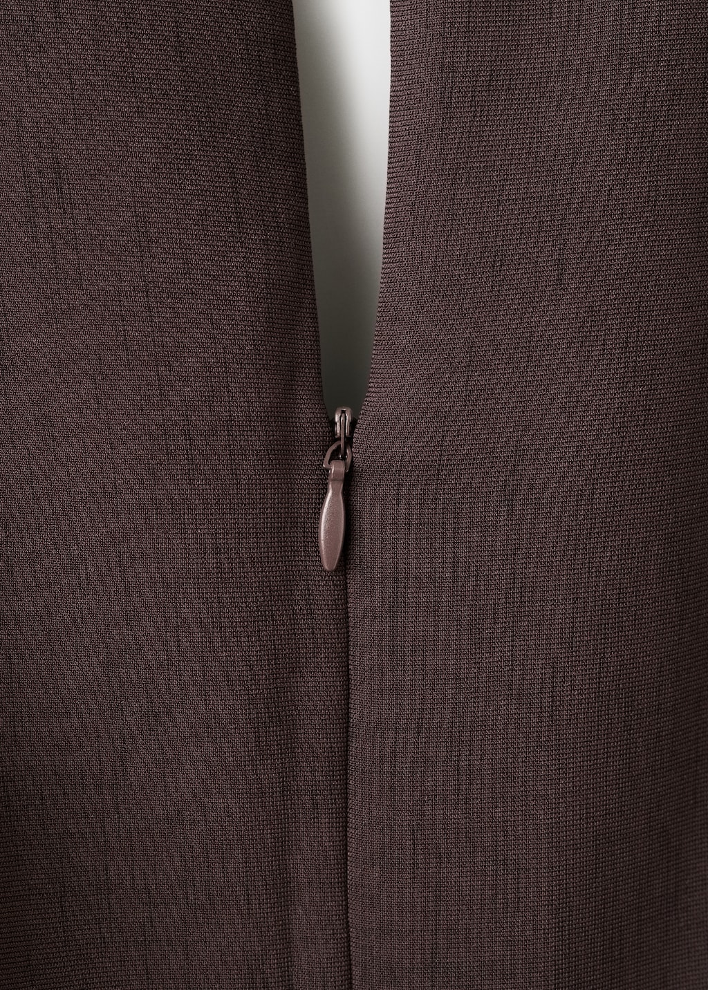 Pleated jumpsuit with belt