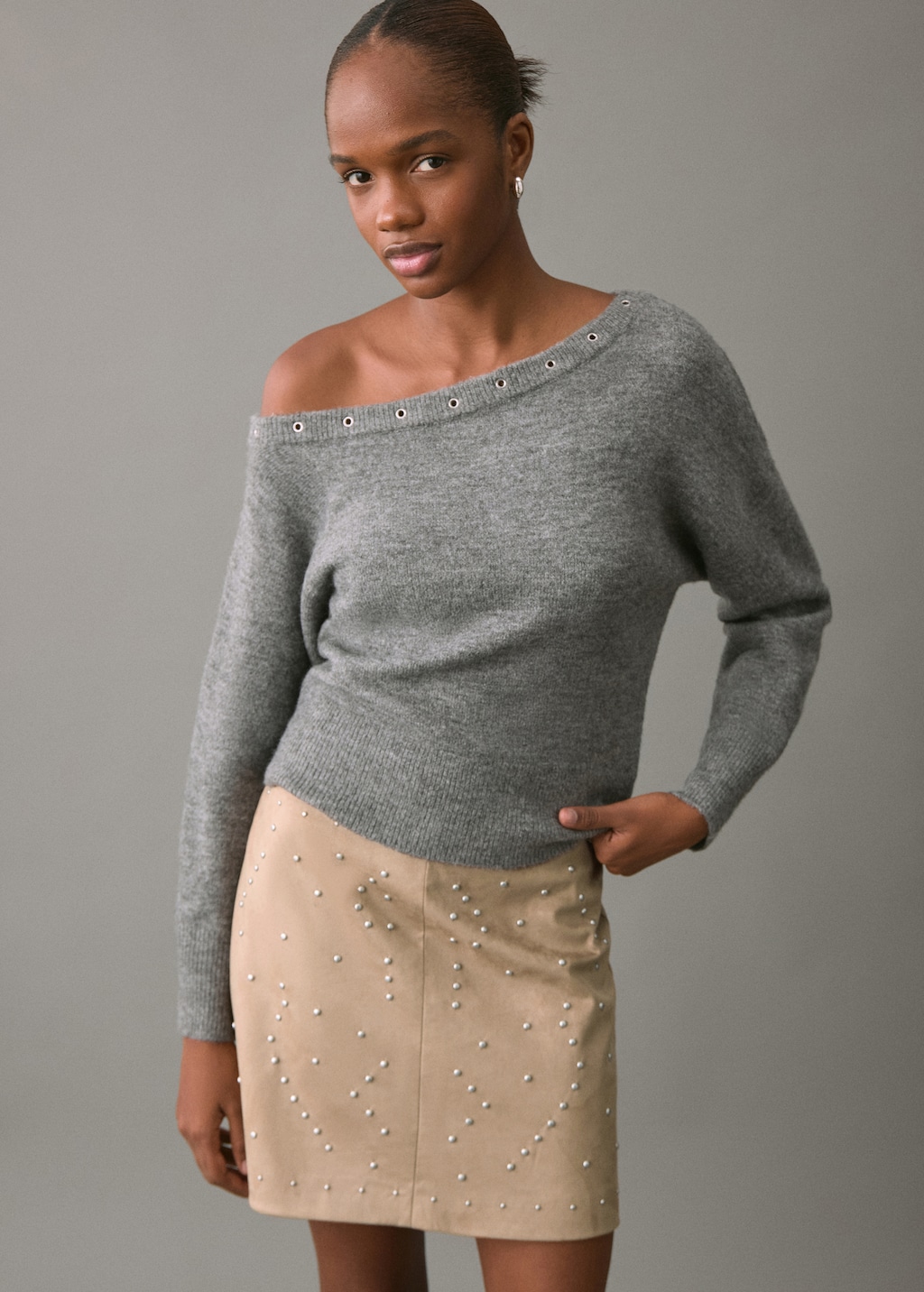 Studded suede short skirt