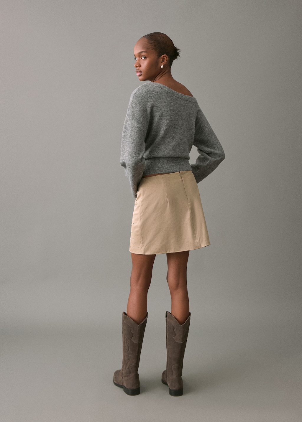 Studded suede short skirt