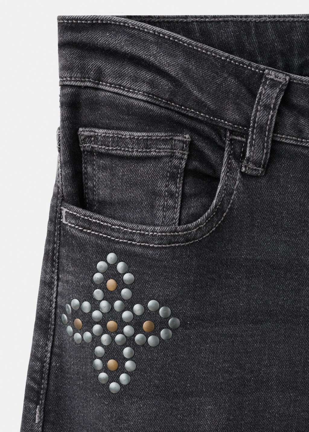 Low-waist studded jeans