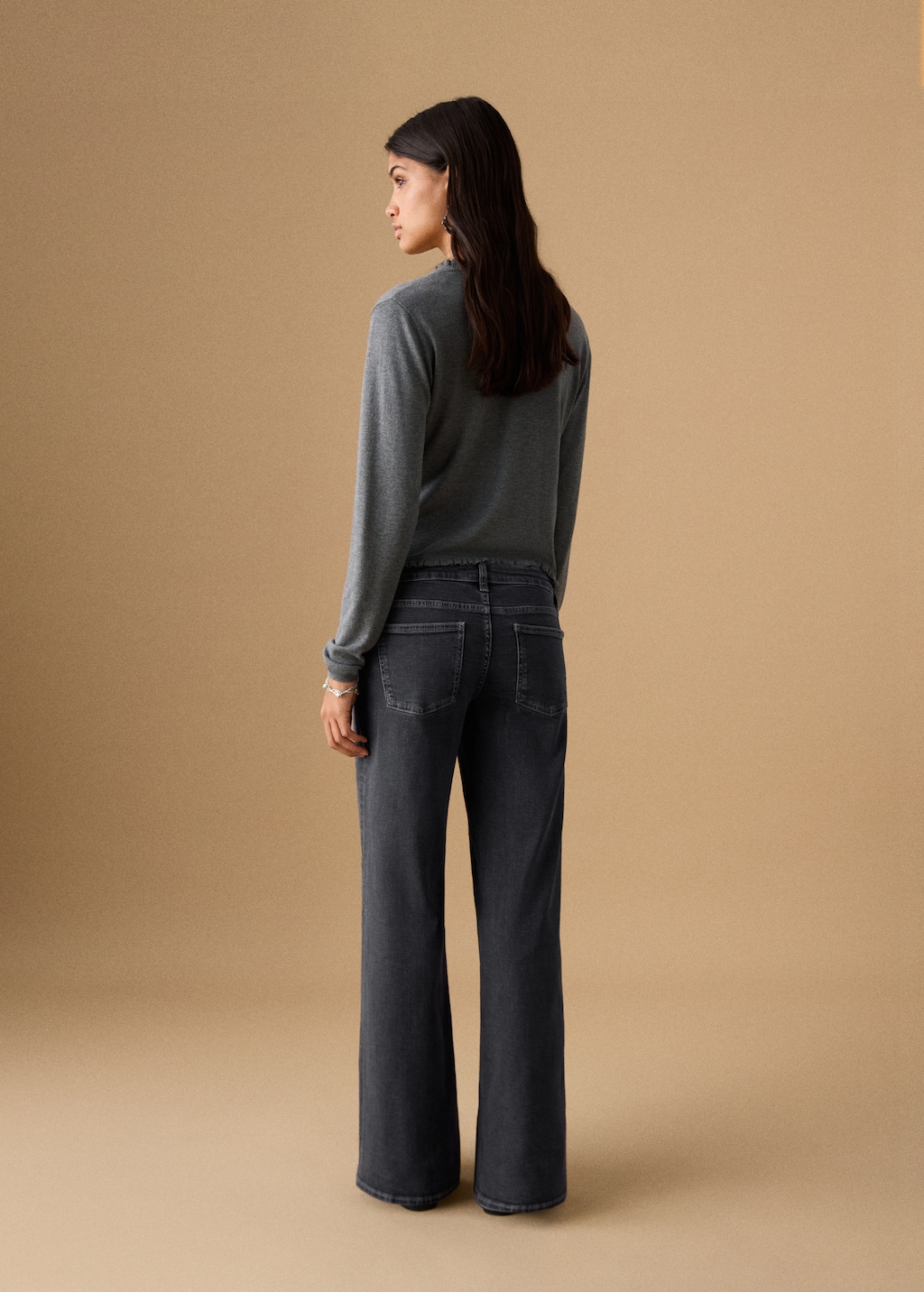 Low-waist studded jeans