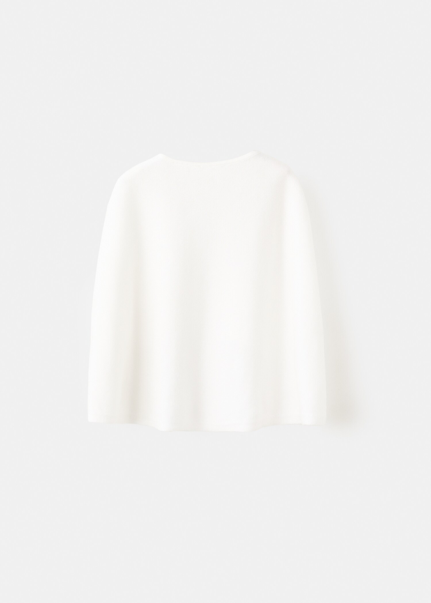 Knitted cape with openwork details - Reverse of the article