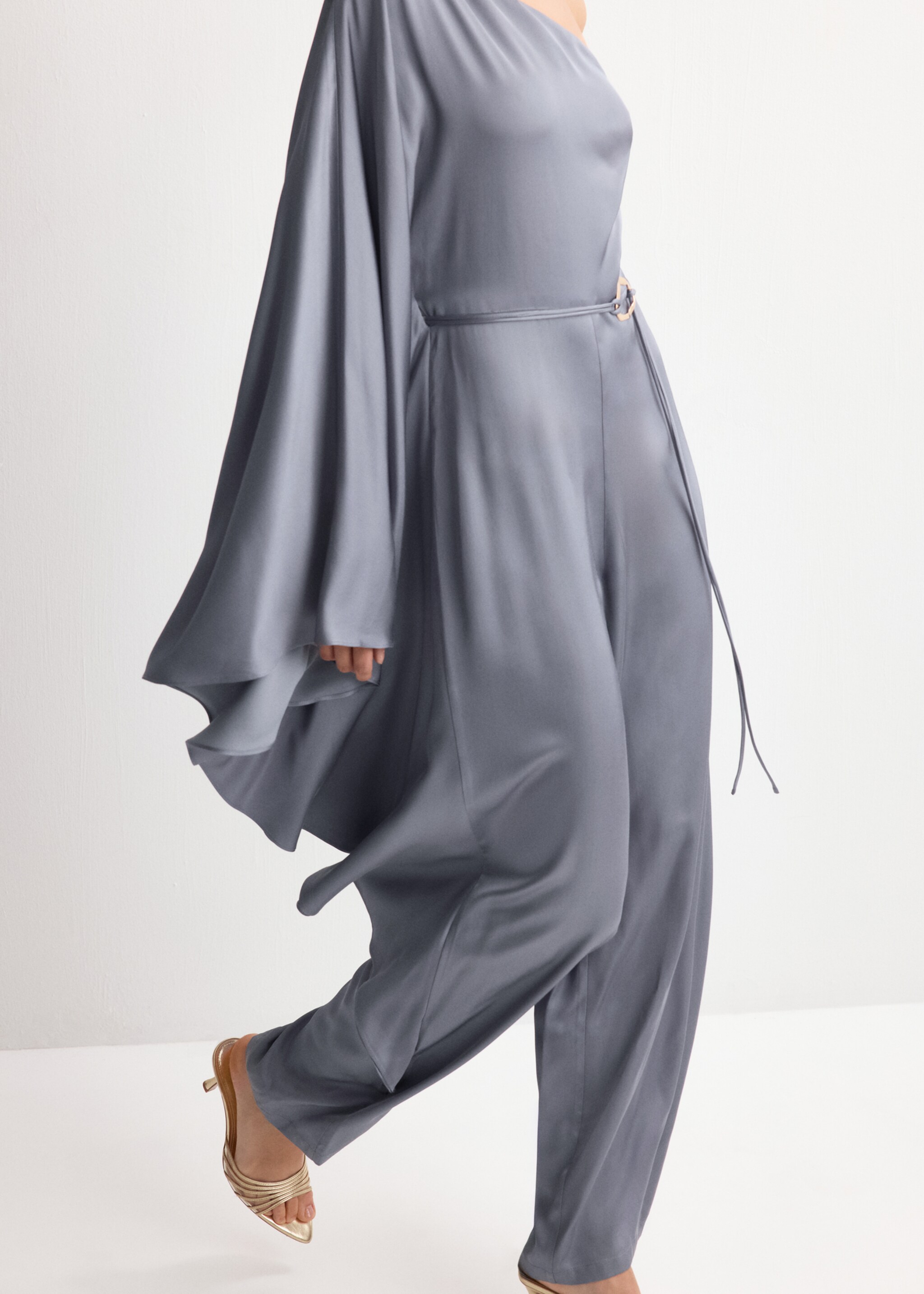 Long jumpsuit with asymmetrical neck - Details of the article 2, Blue. Ref: 27074073-00.