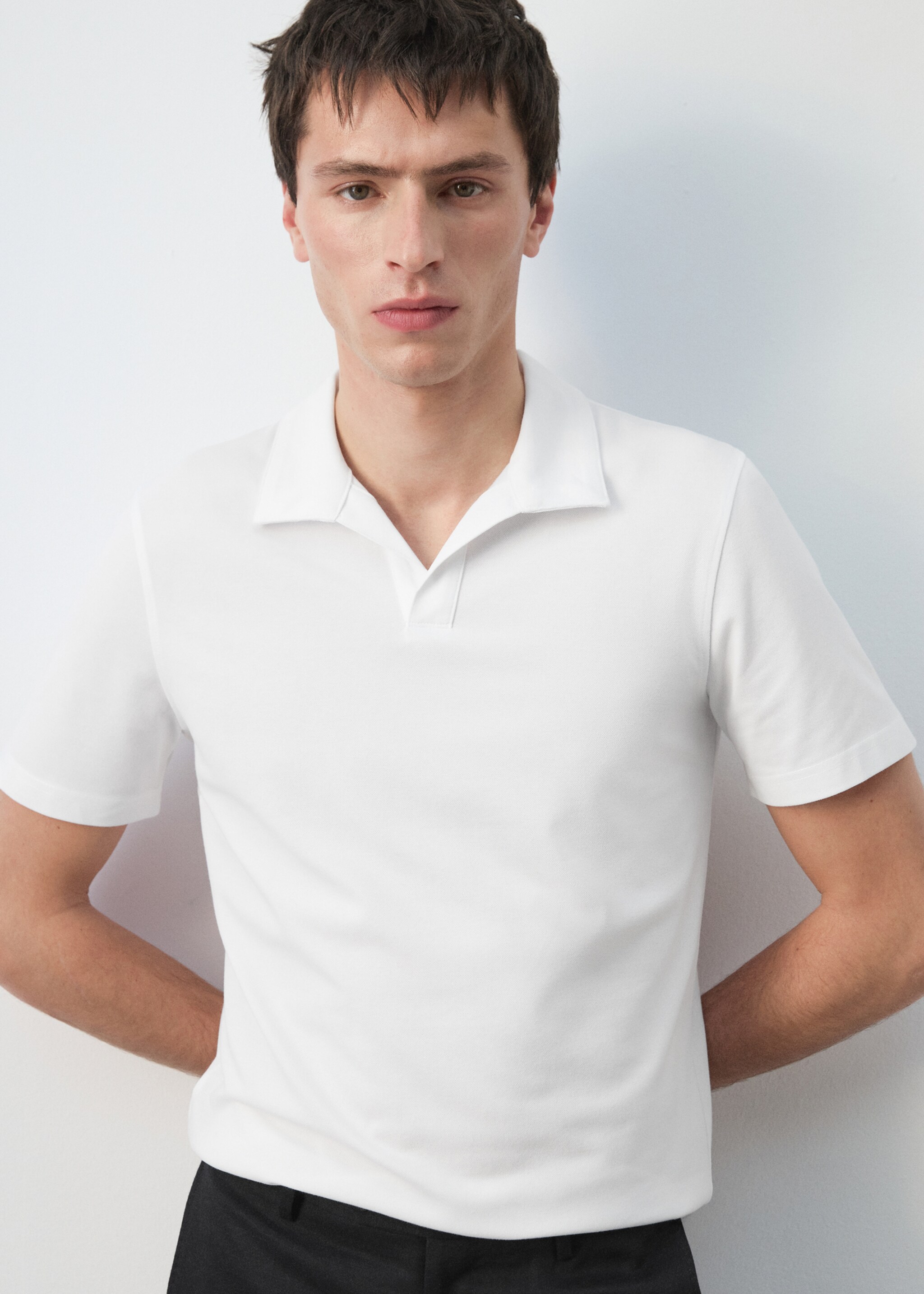 Slim fit piqué polo - Details of the article 6, White. Ref: 27074430-00.