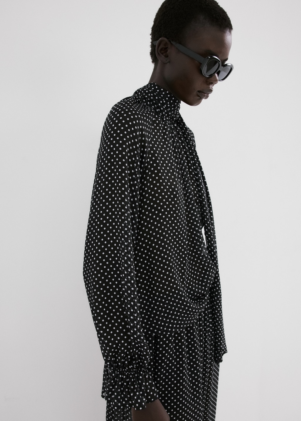 Polka dot high-neck blouse
