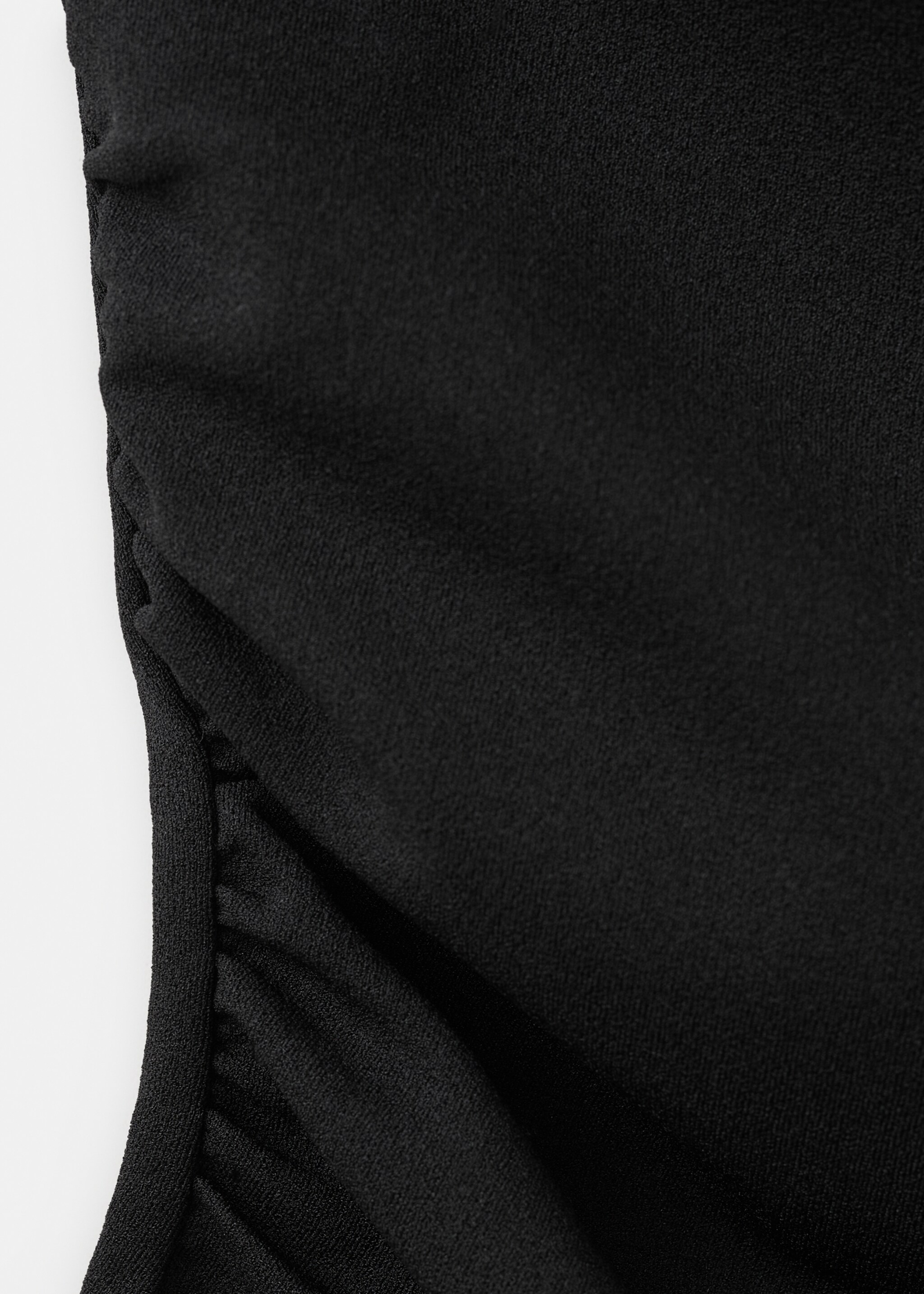 Asymmetrical fitted top - Details of the article 8, Black. Ref: 27075841-00.