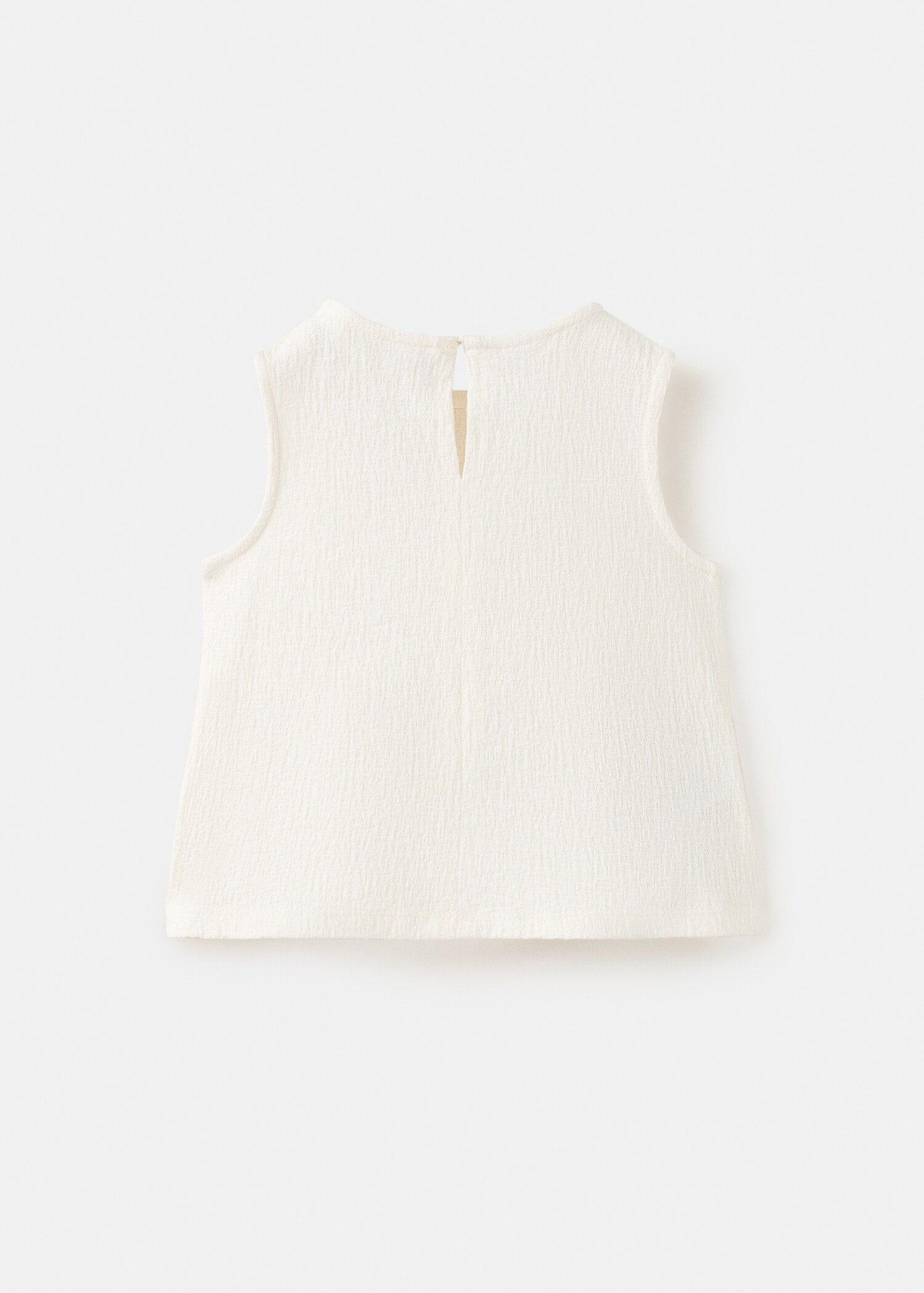 Blusa fluida textura - Reverso del artículo