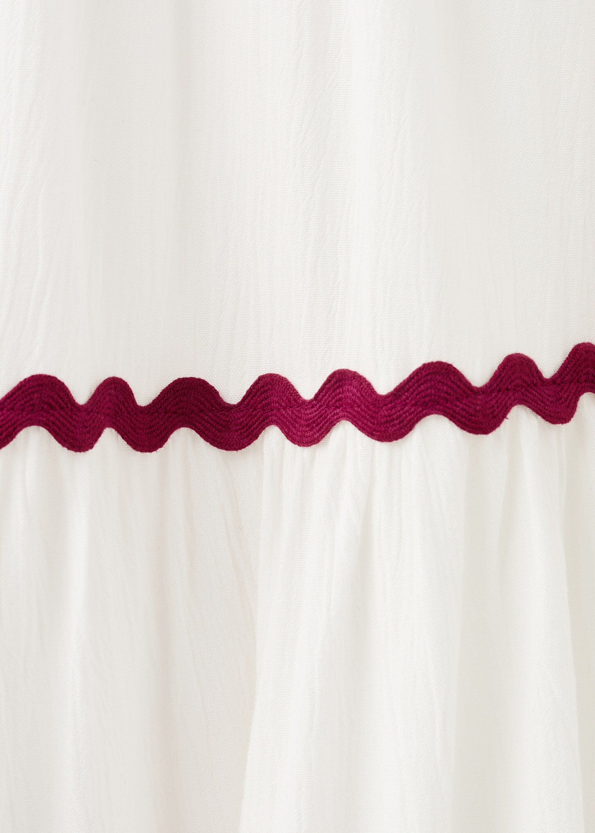 Panel skirt with scalloped details - Details of the article 8, Off White. Ref: 27076741-00.