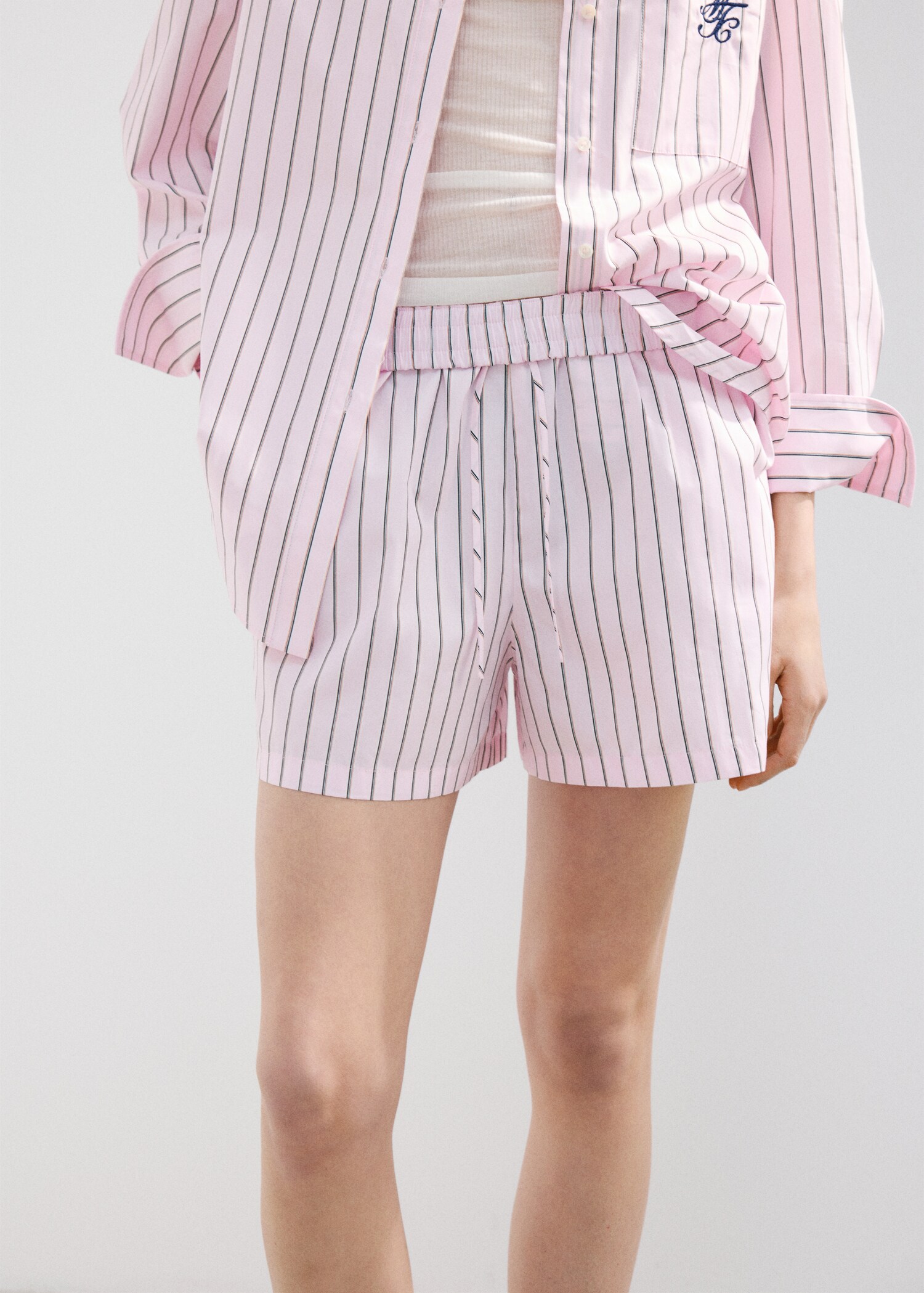 Striped poplin shorts with embroidered message - Details of the article 6