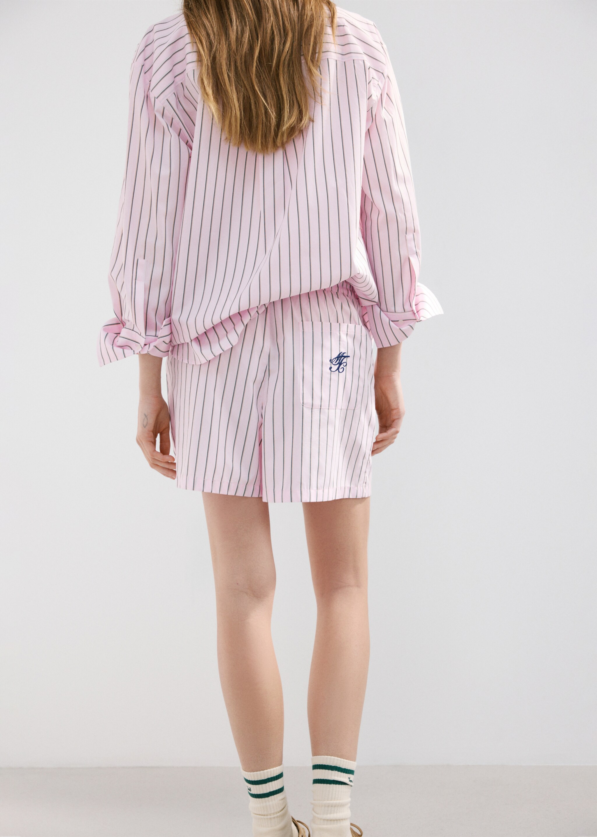 Striped poplin shorts with embroidered message - Reverse of the article, Pastel Pink. Ref: 27077167-00.