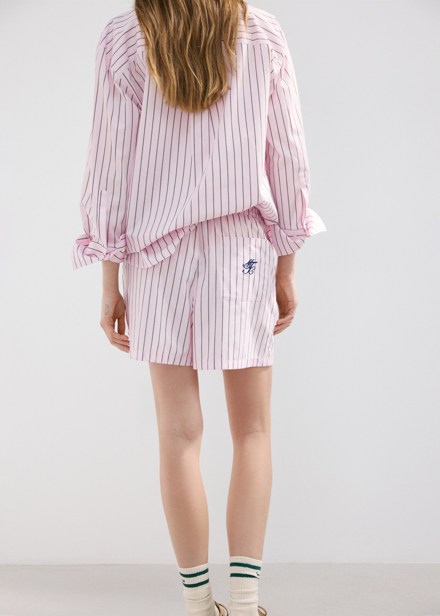 Striped poplin shorts with embroidered message - Reverse of the article