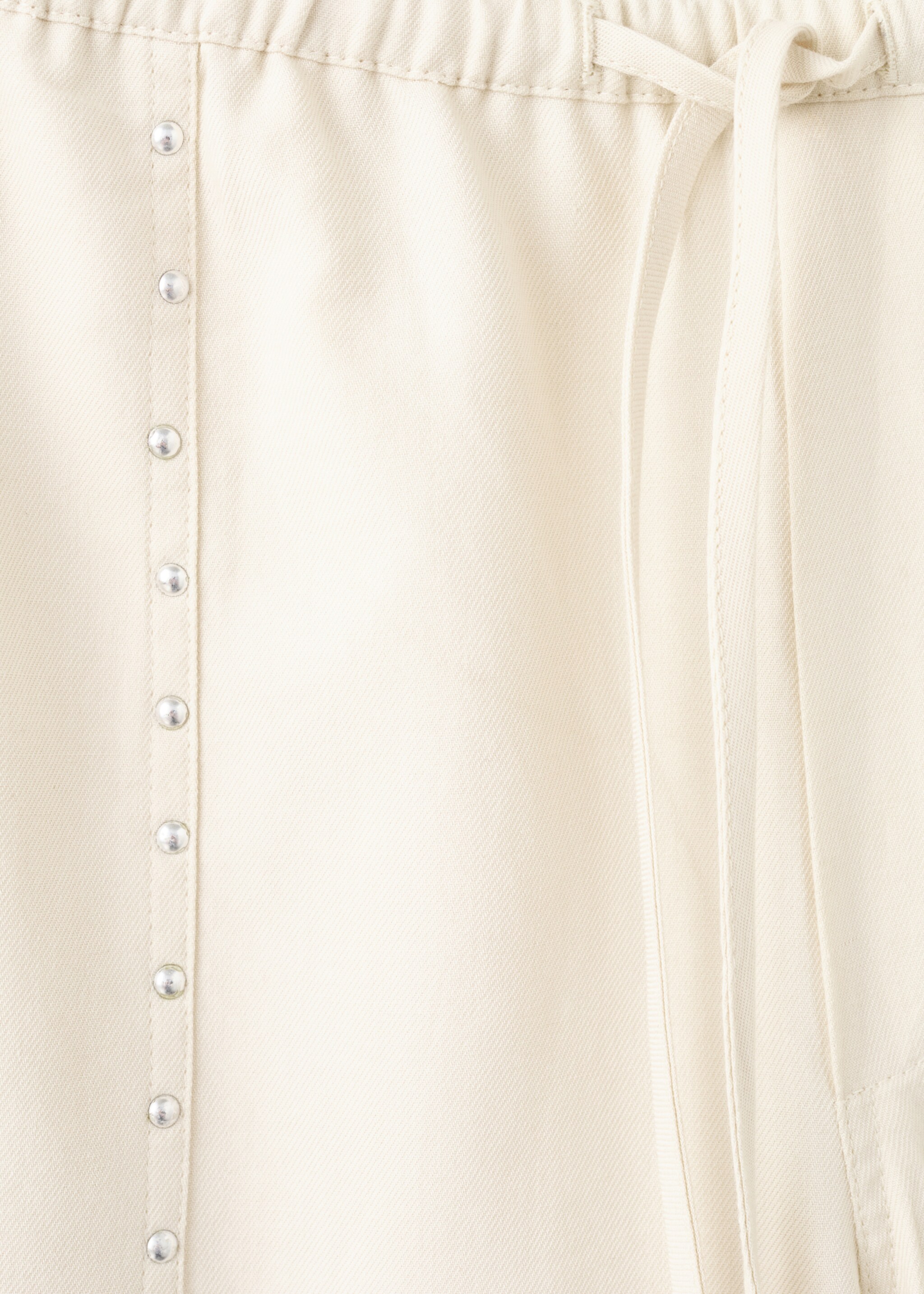 Fluid trousers with studs - Details of the article 8, Sand. Ref: 27077900-00.