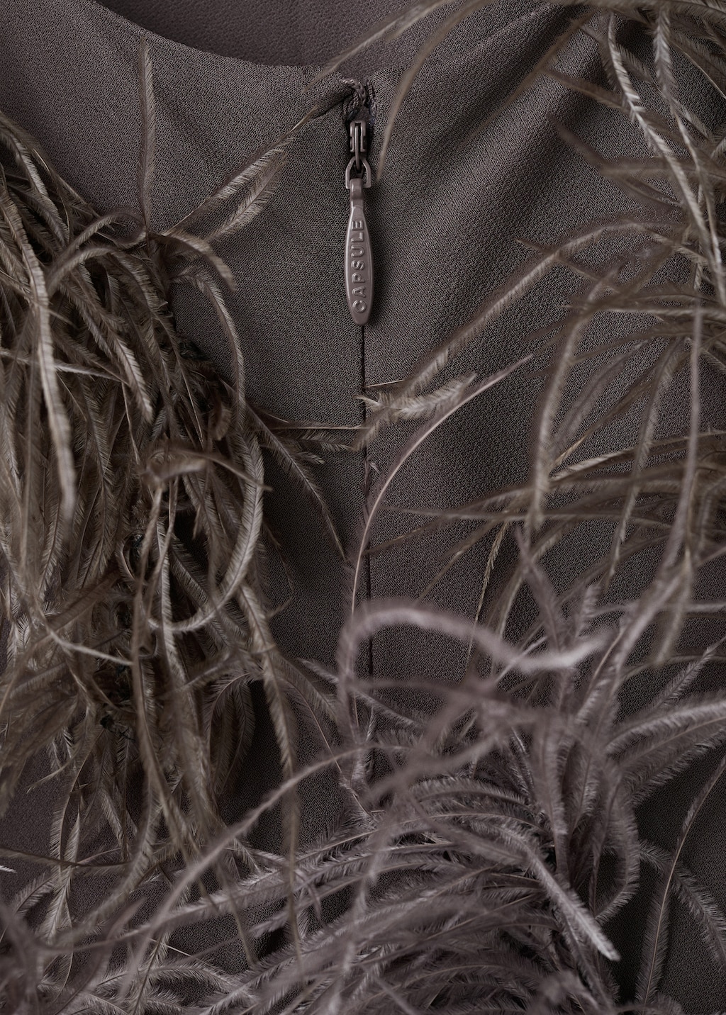 Feather dress with fringed hem