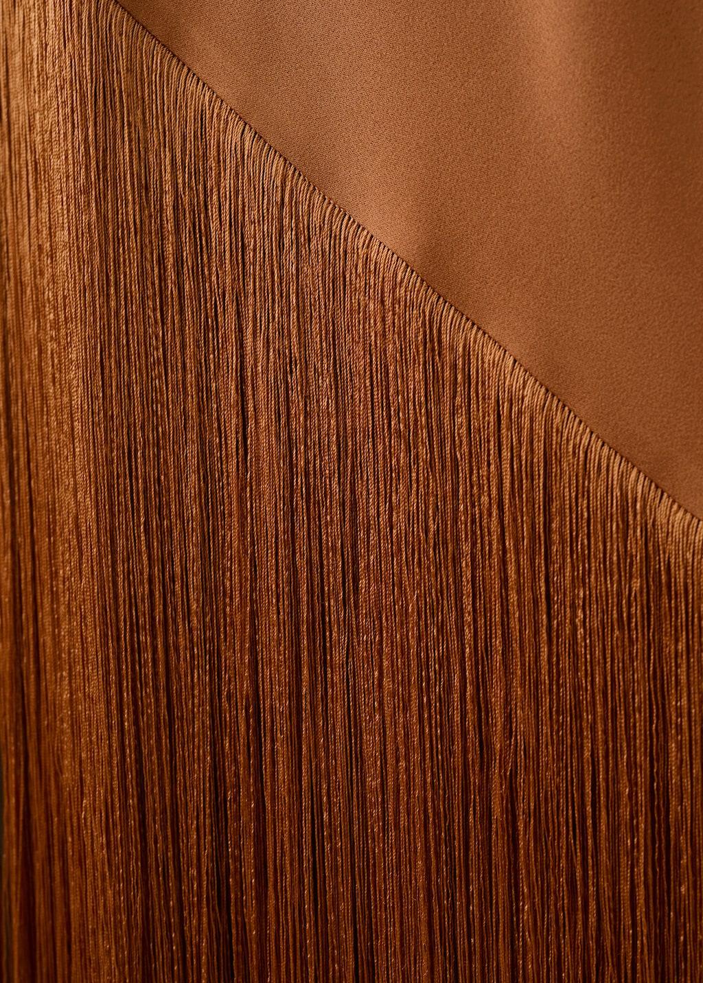 Asymmetrical satin dress with fringes