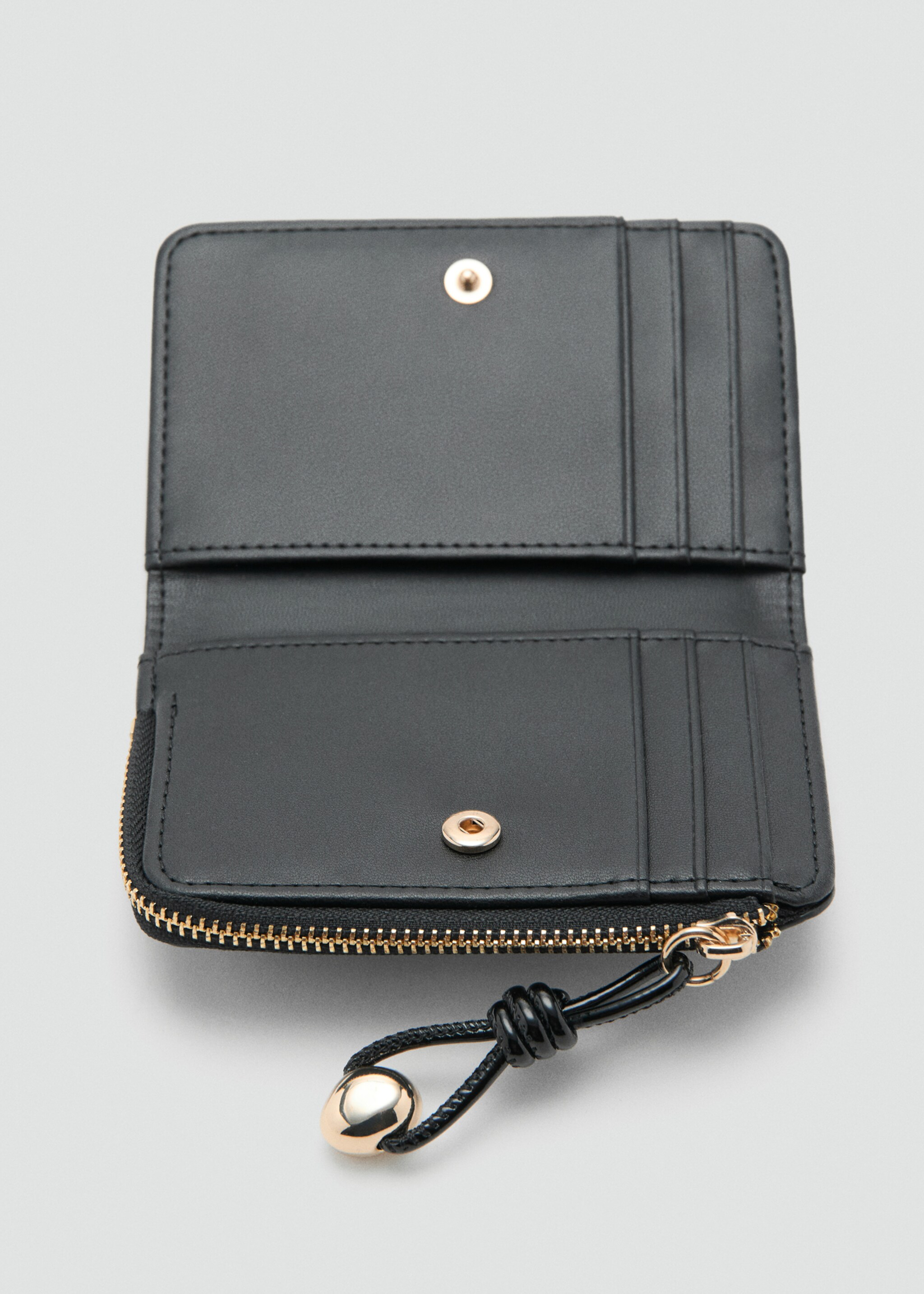 Petit portefeuille avec mini perles - Détail de l'article 1, Noir. Ref: 27081236-00.