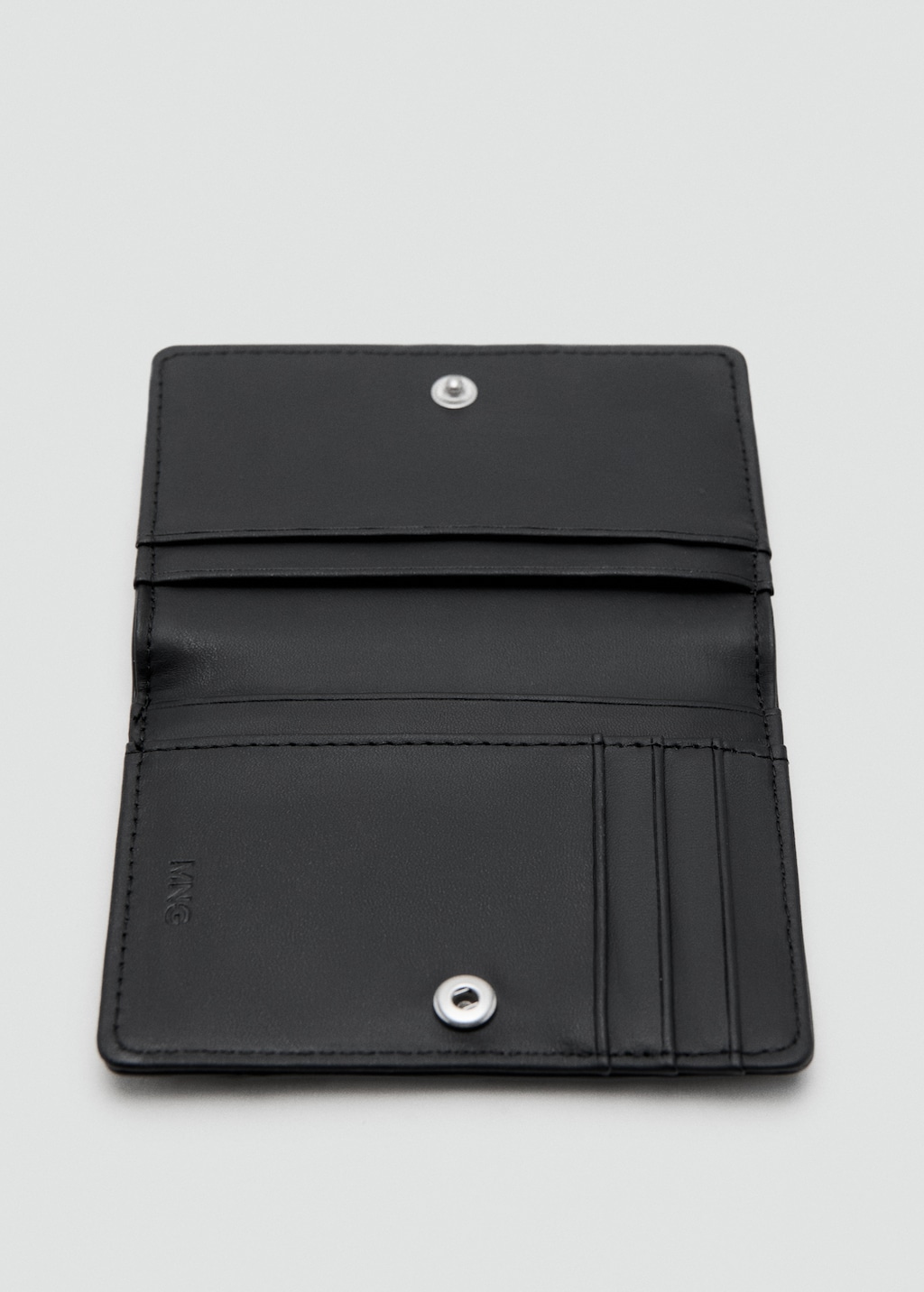 Wallet with embossed effect
