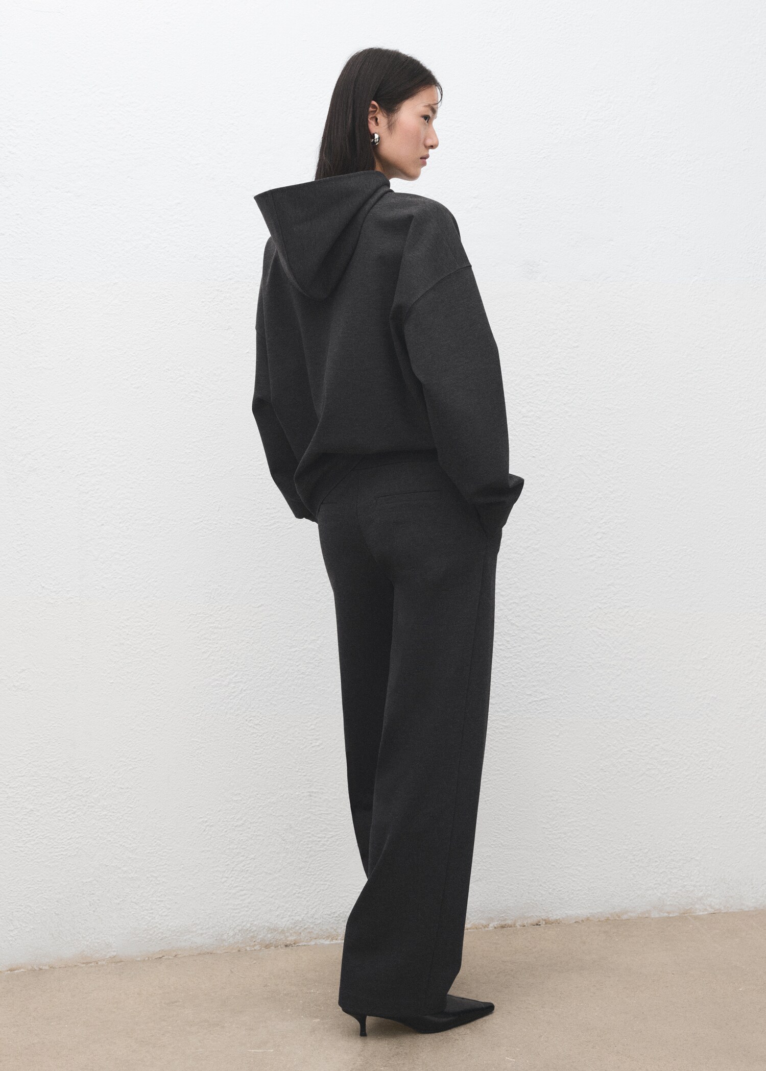 Speckled knitted sweatshirt with hood - Reverse of the article