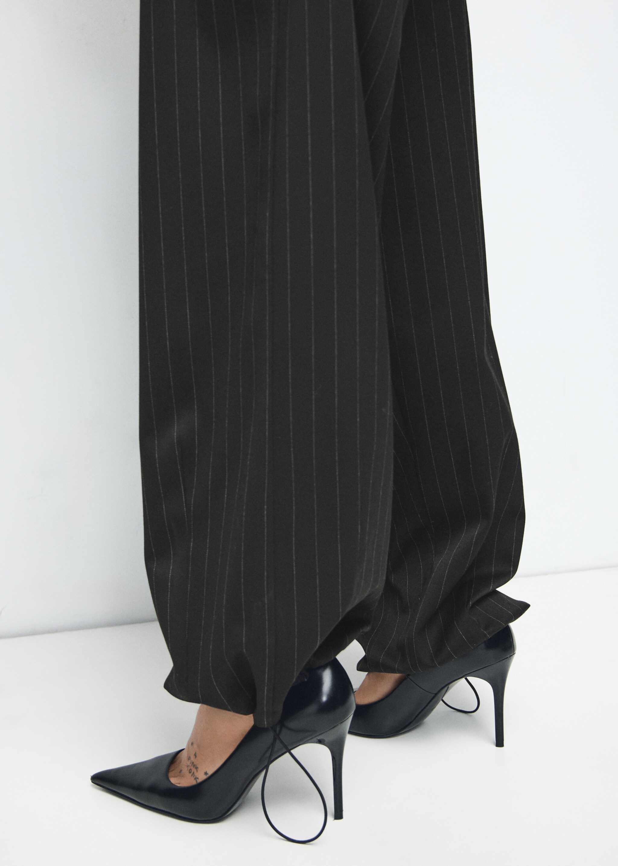 Balloon pinstripe trousers - Details of the article 1, Black. Ref: 27081339-00.