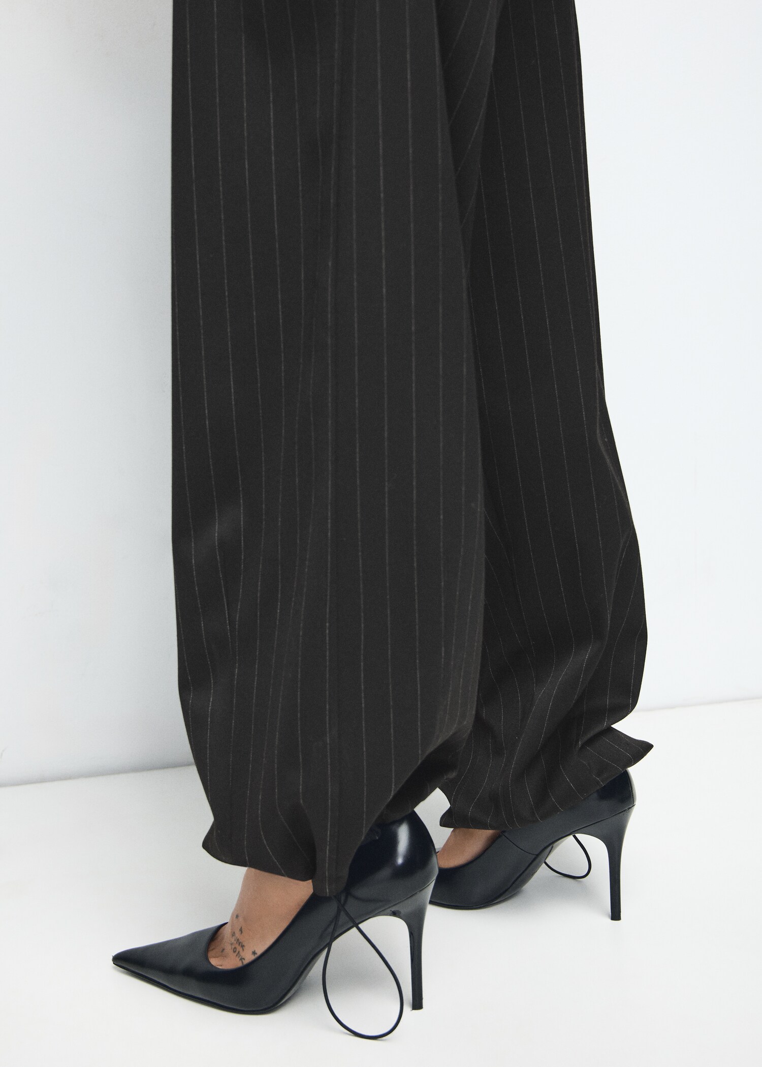Balloon pinstripe trousers - Details of the article 1