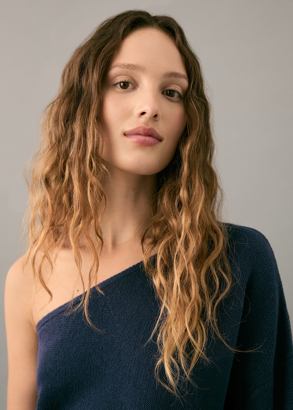 Asymmetric knit sweater