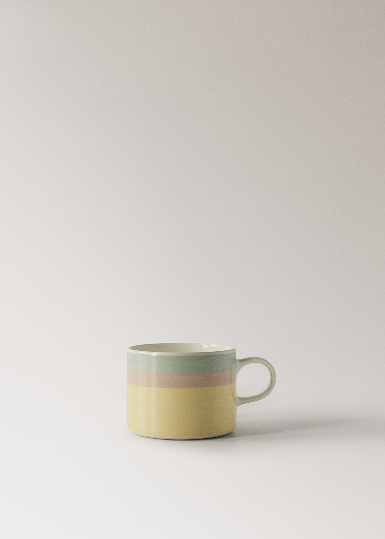 Striped stoneware coffee cup - Article without model