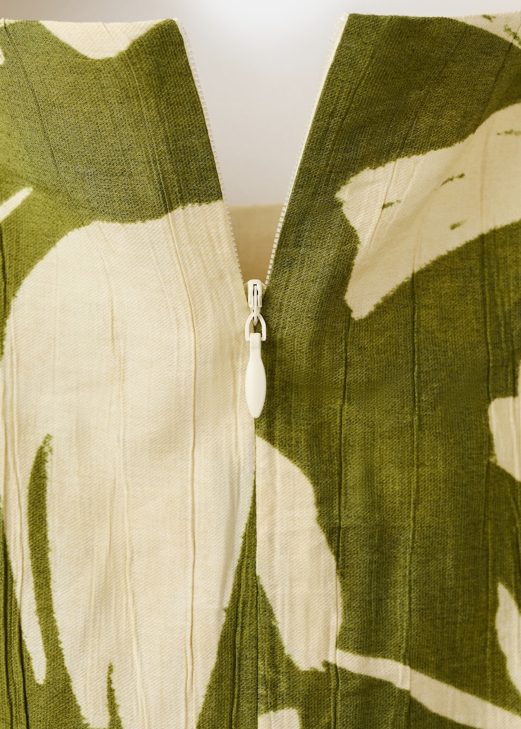 Peplum top with pleated panels - image 5
