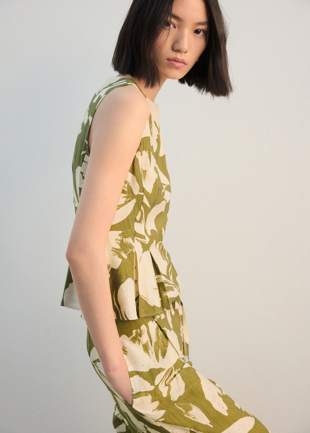 Mango Peplum top with pleated panels