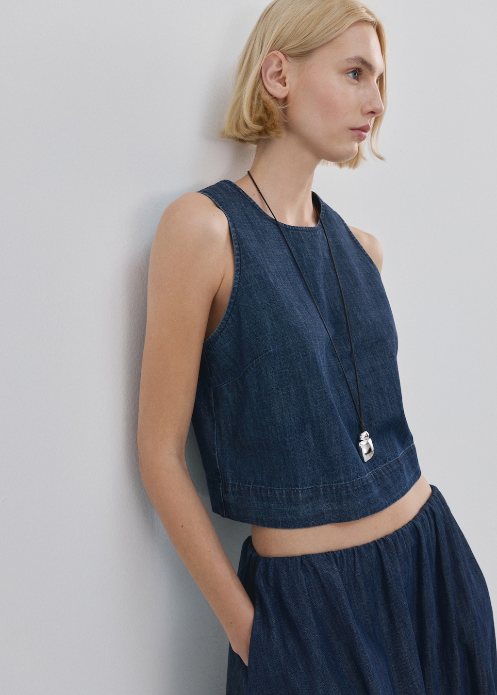 Denim skirt with stitched hem - image 4