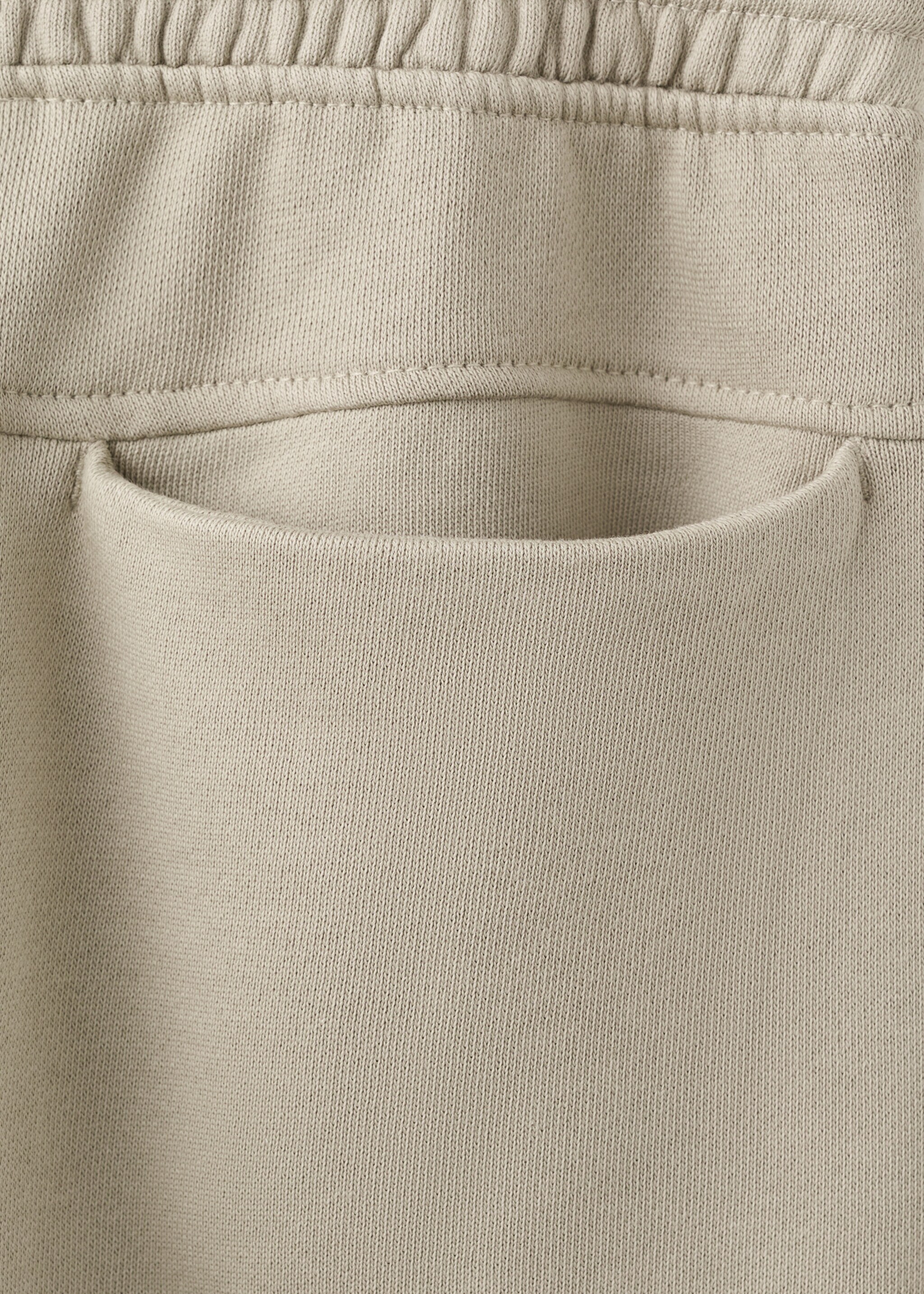 Cotton joggers with elastic waist - Details of the article 0, Sand. Ref: 27083278-00.